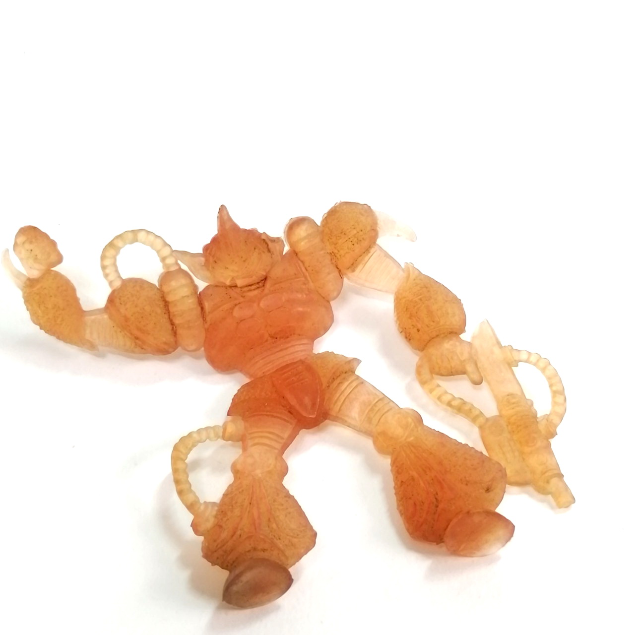 ตุ๊กตุ่นแอ๊นท์ หุ่นยนต์ ขนาด 2 นิ้ว ตามรูป ตัวยางขนาดบาง อ่อนกึ่งใสสีส้ม