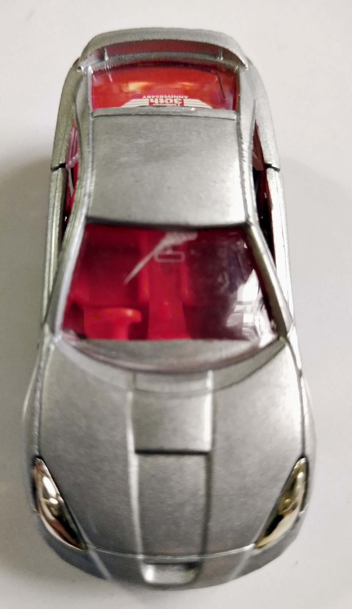 ของเล่น ของสะสม**มีตำหนิ กระจกร้าว ,รถเหล็ก Diecast car รถสปอร์ตสีเงิน เปิดประตูได้ Toyota Celica จาก Tomica