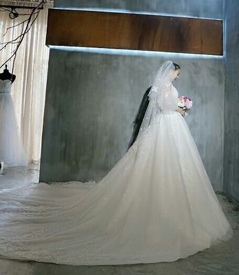 ชุดแต่งงาน แขนแต่งระบาย หางยาว เชือกผูกหลัง