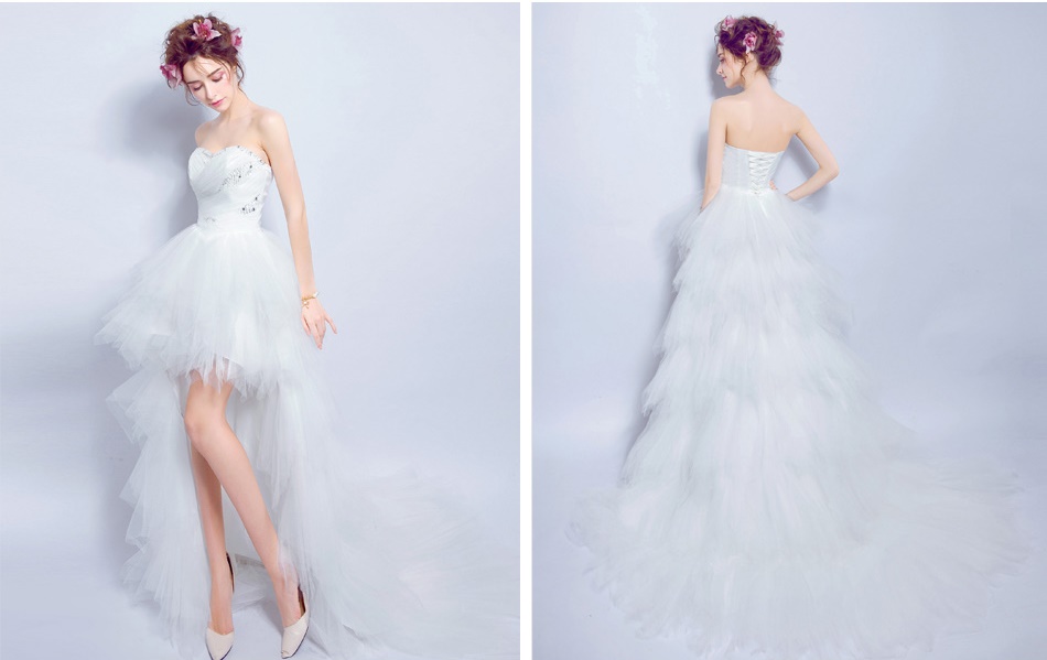 Pre-order ชุดแฟนซี ชุดราตรีสั้น หน้าสั้นหลังยาว สีขาว เกาะอก จับจีบ ปักเลื่อมช่วงอก กระโปรงเป็นชั้น เชือกผูกหลัง