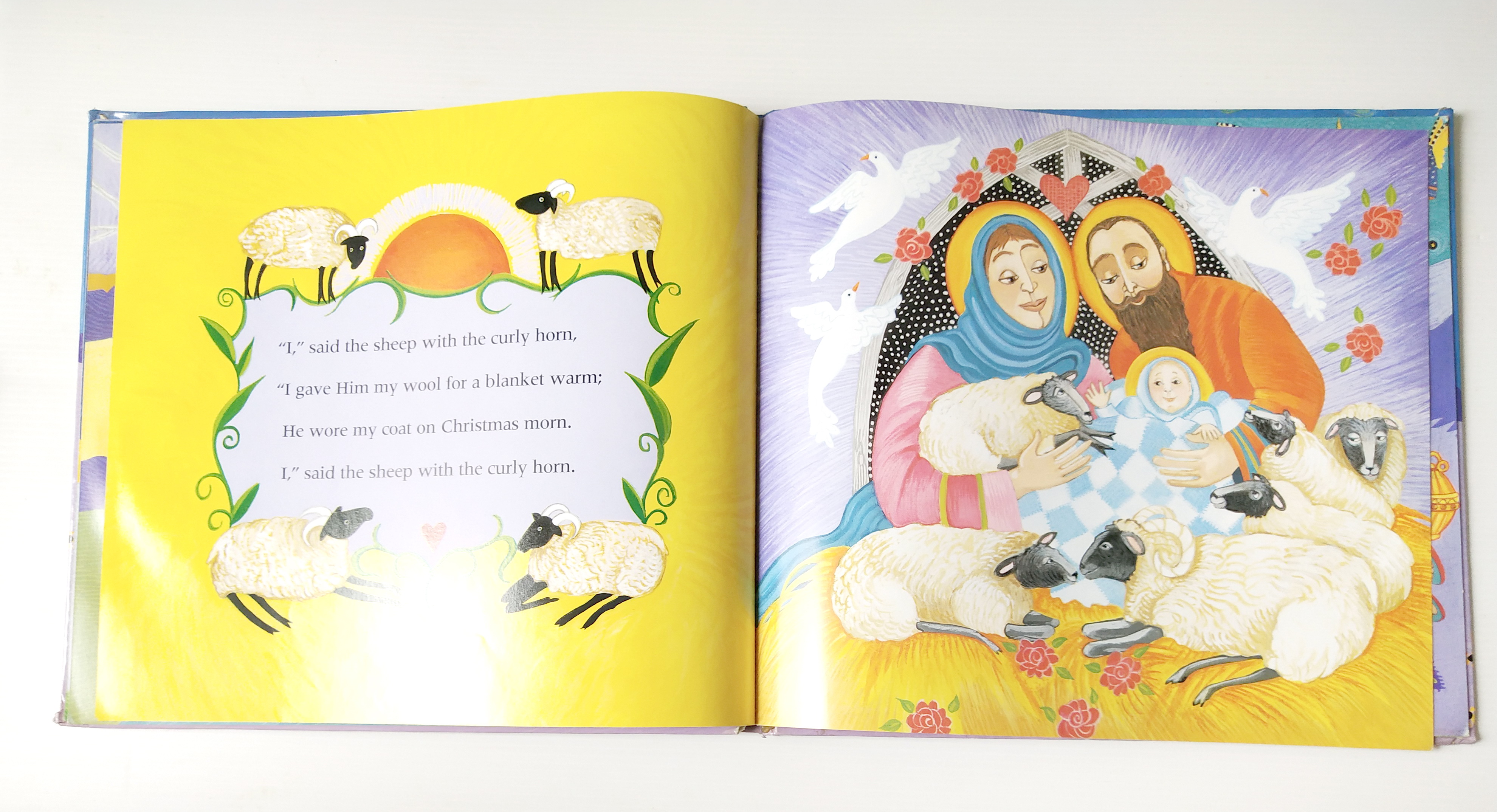 หนังสือนิทาน**มีตำหนิ โปรดดูทุกภาพ ฉบับภาษาอังกฤษ The Friendly Beasts ,a Christmas Carol. ภาพโดย Sharon MacGinley