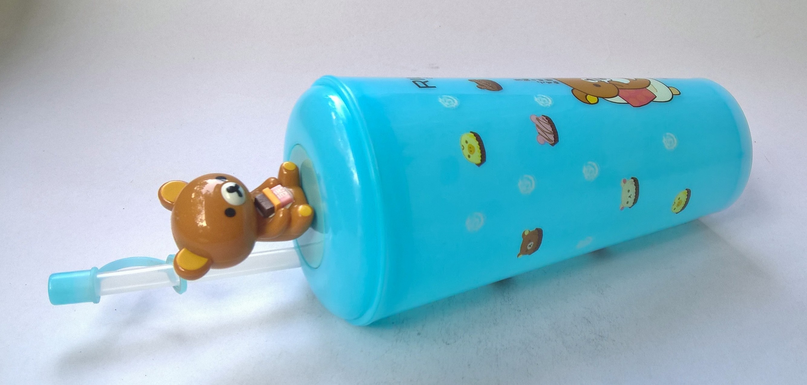 Collectible Plastic Grass"Brown Rilakkuma Topper on the Blue Cute Printed Grass" ,ของสะสมจาก7-11 แก้วพลาสติกสีฟ้าพิมพ์ลายน่ารัก พร้อมท๊อปเปอร์ หมีรีลัคคุมะสีน้ำตาล