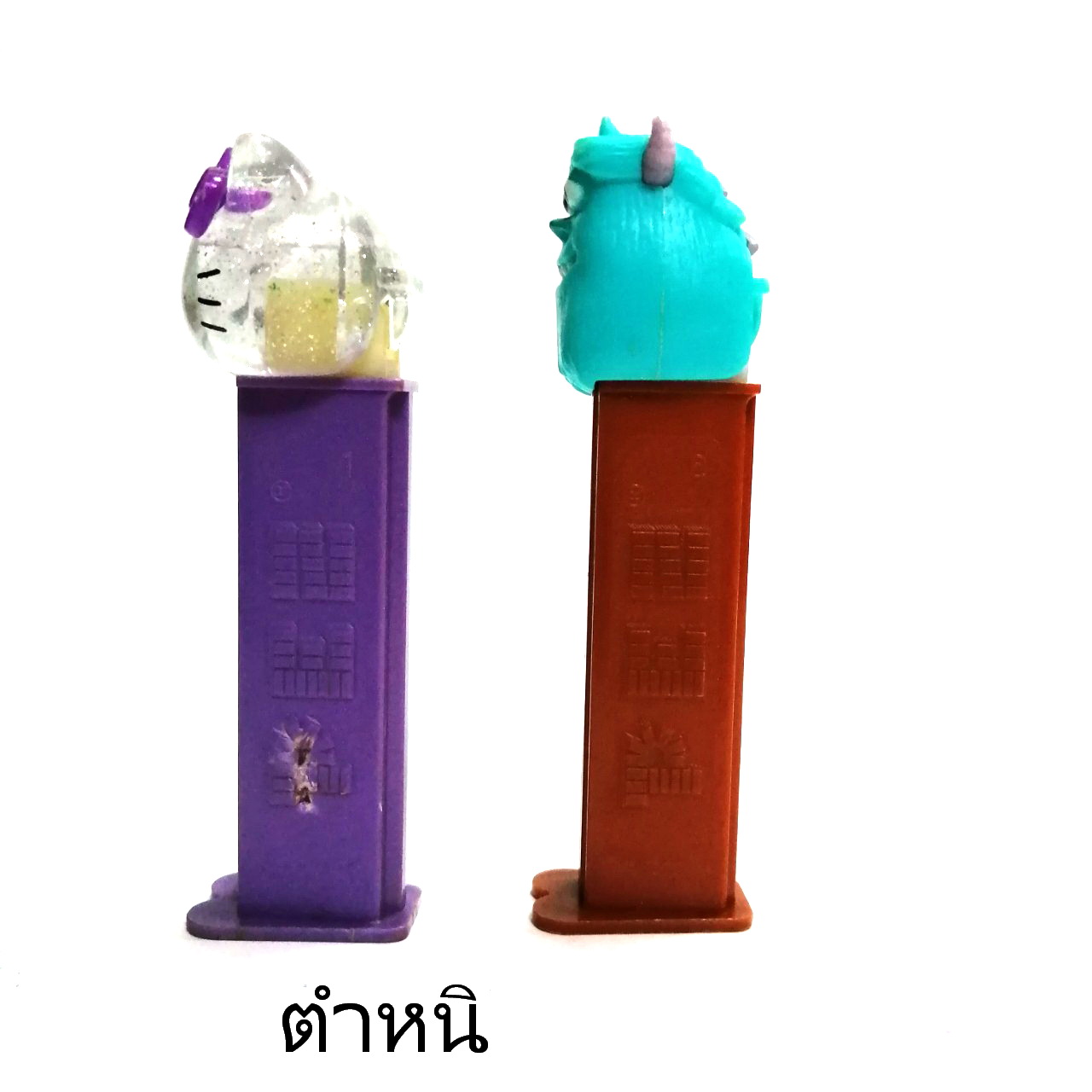 ที่ใส่ขนม PEZ รูป คิตตี้(ใส)และ มอนสเตอร์อินค์ งานเก่าเก็บ ขายตามสภาพ ขายคู่