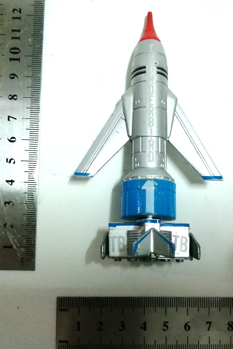 จรวดธันเดอร์เบิร์ด1 (วิหคสายฟ้า 1) ยานธันเดอร์เบิร์ด1 Thunderbird1 วัสดุเหล็กผสมพลาสติก ทำสีสำเร็จ ของ Bandai ปี 1997** กลไกขยับปีชำรุดเสื่อมตามเวลา สะสมสภาพดี เก่าเก็บ