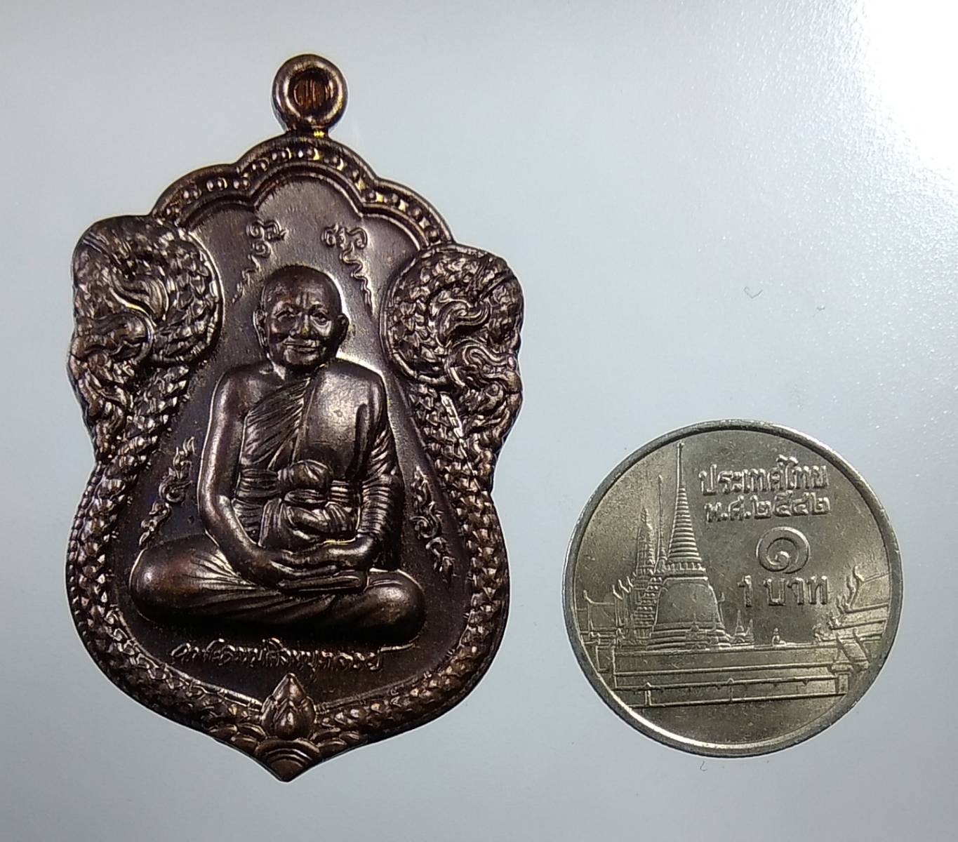 A1949 เหรียญใบเสมาเศรษฐีใหญ่ หลวงพ่อจรัญ วัดอัมพวัน จ.สิงห์บุรี ปี2554