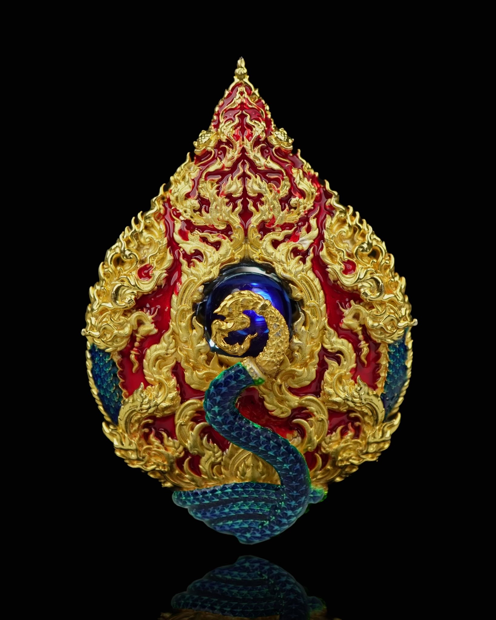 เหรียญมณีนาคราชแก้วบุญฤทธิ์ รหัส5 เนื้อบรอนซ์ชุบทอง ลงยาแดงน้ำเงิน