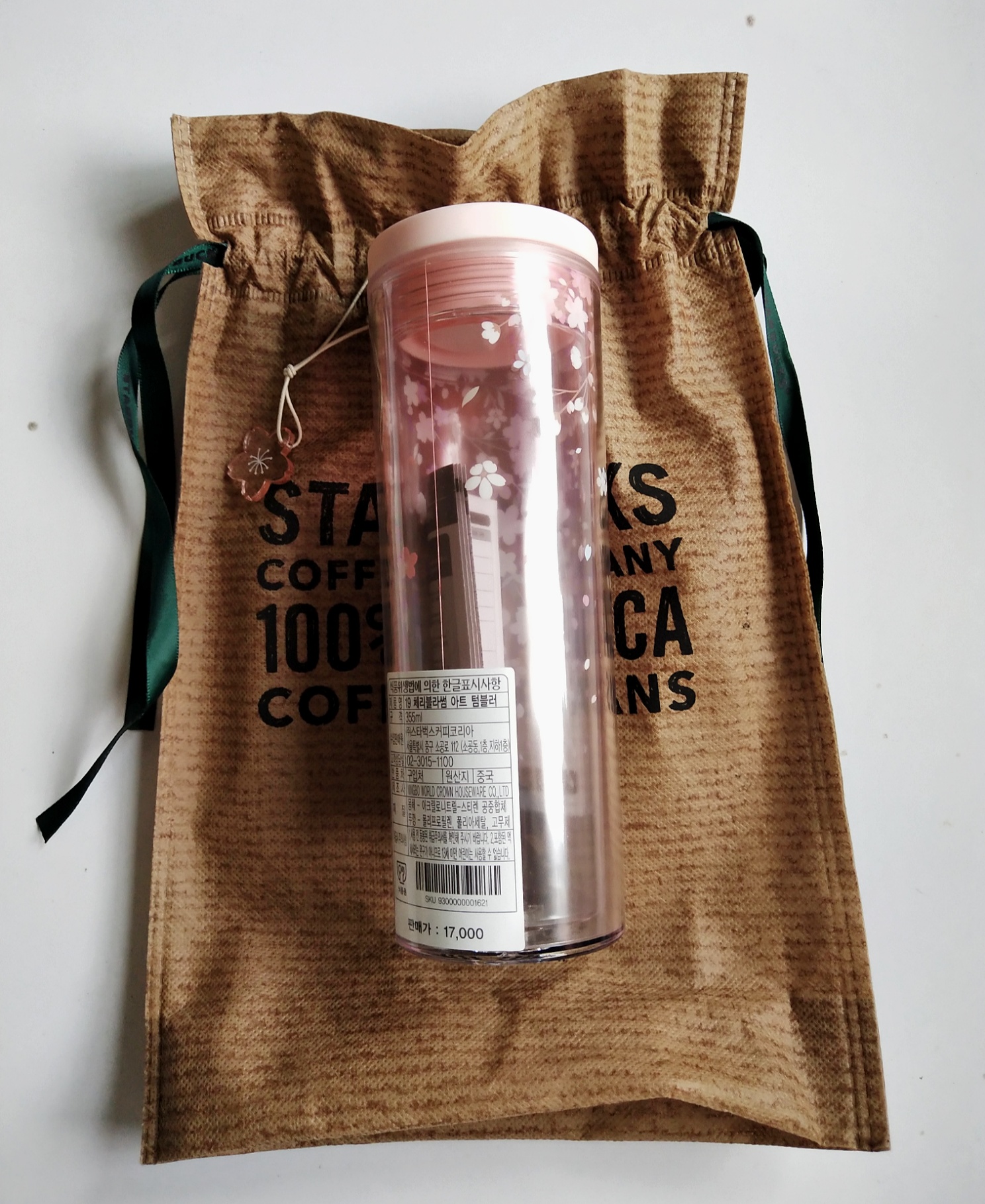 ของสะสมจากสตาร์บั๊ค แก้วน้ำสีชมพูหวานพิมพ์ลาบดอกซากุระที่แก้ว พร้อมฝาสีชมพู คอเล็คชั่นดอกซากุระ จากเกาหลี มาพร้อมถุงผ้า ของแท้จากStarbucks เกาหลี