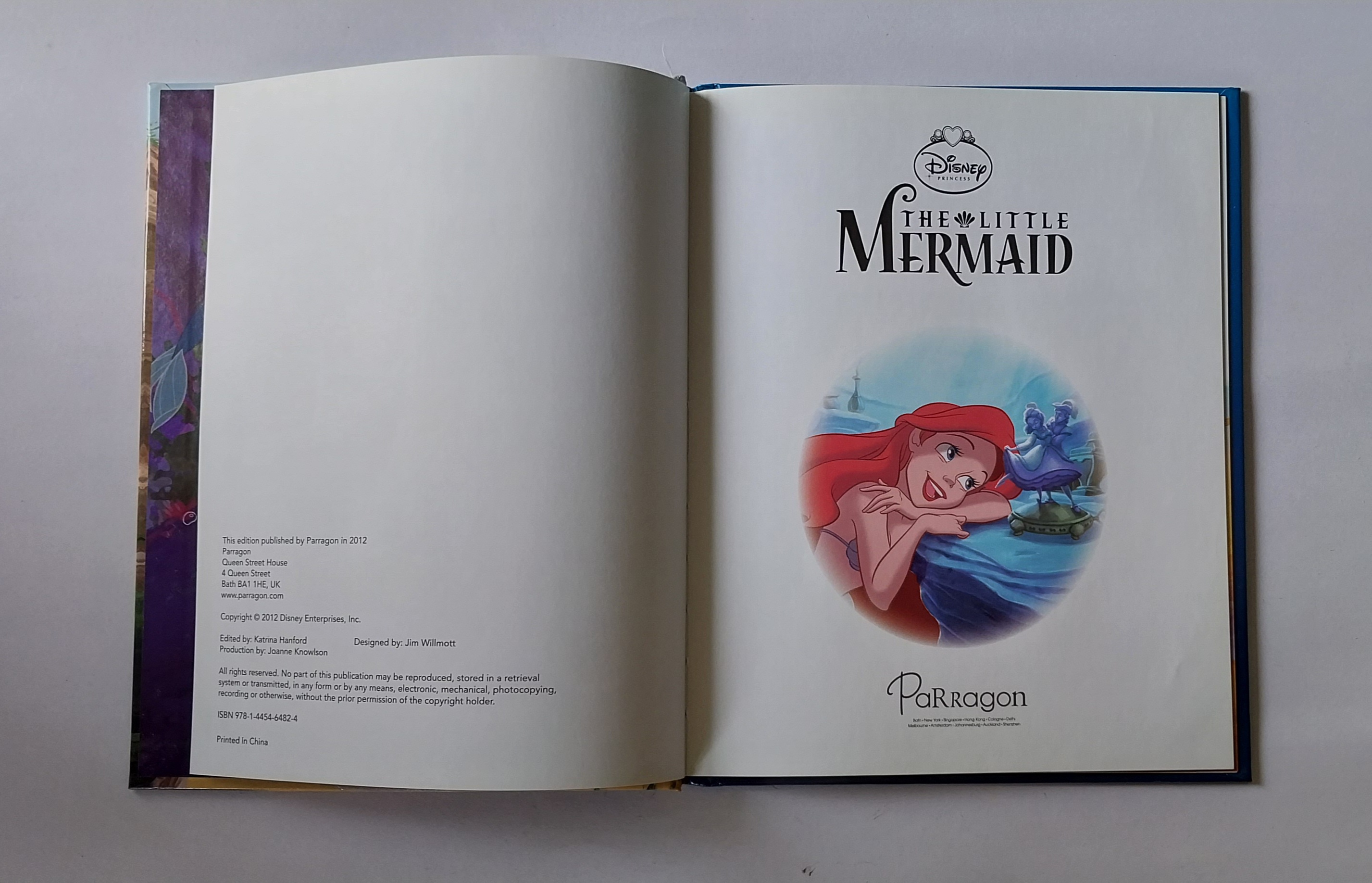 มีหลายภาพ,เจ้าหญิงเงือกน้อยแอเรี่ยล,หนังสือนิทานปกแข็งภาษาอังกฤษ ขนาด 22 ใหม่-มีเพชรติดที่เสื้อเจ้าชายอีริกที่หน้า22 ซม. Disney, the Little Mernaid,Magical story.ปกเป็นภาพ3มิติ ปีที่พิมพ์ 1012