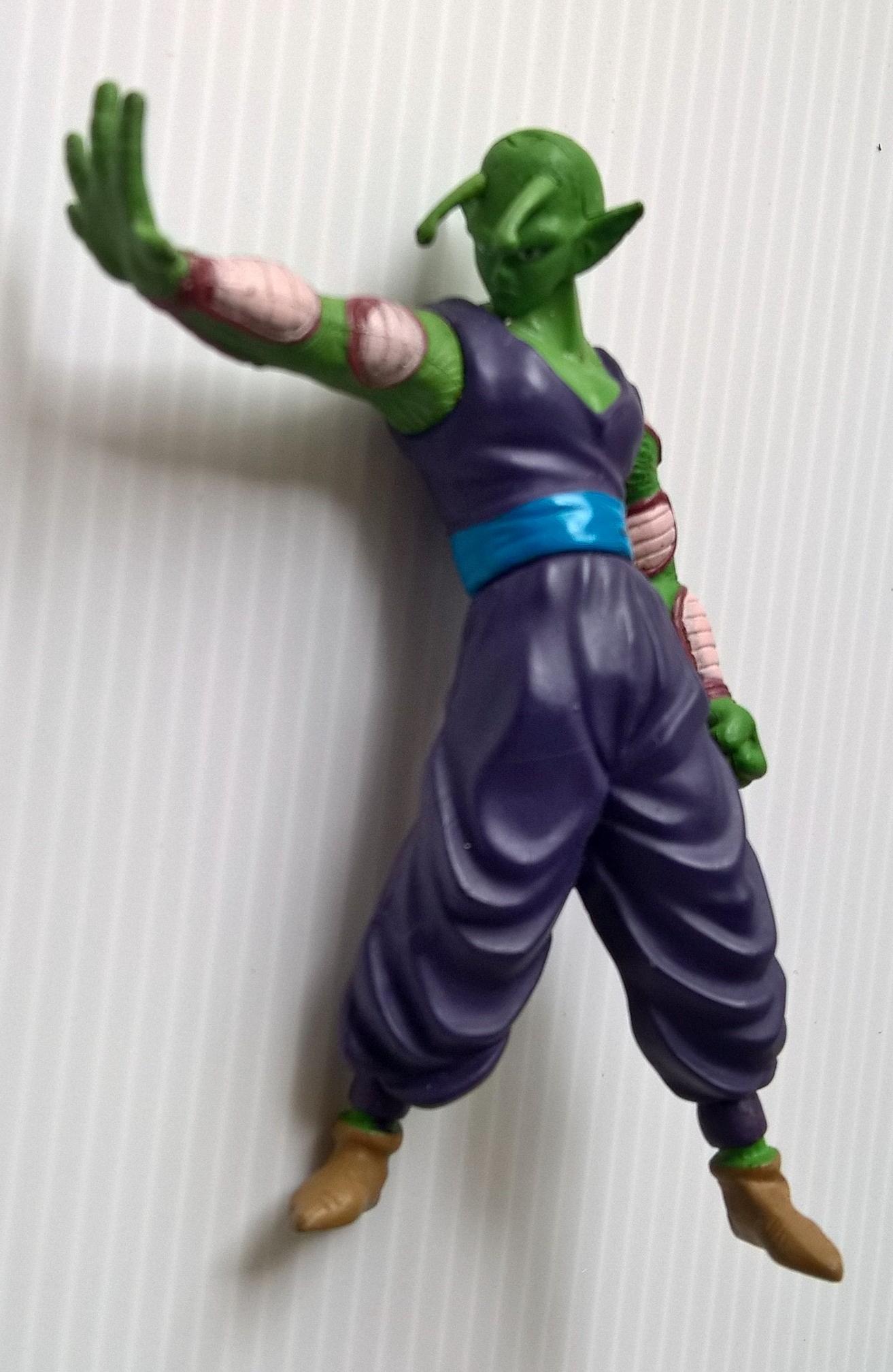 โมเดล พิคโคโร่ สูงประมาณ 9 ซม.(พิคโกโร่ (อังกฤษ: Piccolo) เป็นตัวละครที่เป็นชาวนาเม็กและตัวละครฝ่ายธรรมะ ซึ่งเมื่อก่อนเคยเป็นลูกของ ราชาปีศาจพิคโกโร่-https://th.wikipedia.org/wiki/)ในการ์ตูนเรื่อง ดราก้อนบอล