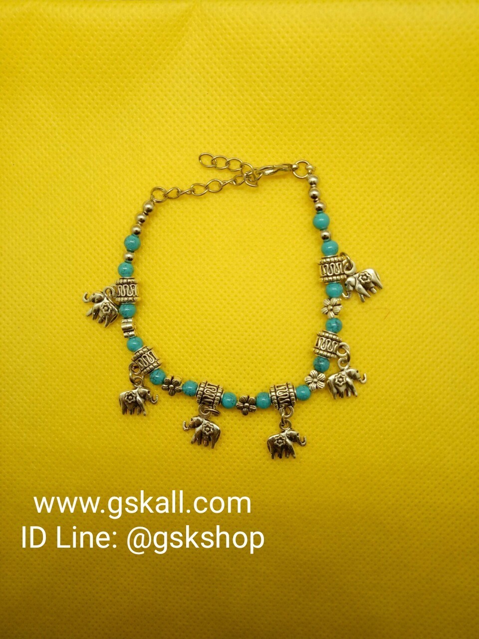 สร้อยข้อมือลูกปัดสีฟ้า-สีเงินห้อยช้าง