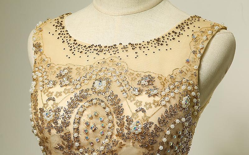 พร้อมส่ง ชุดราตรียาว แขนกุด สีทอง แต่งเกล็ดสีทอง พร้อมมุก ระยิบระยับ เนื้อผ้าตาข่าย มาพร้อมเข็มขัดรูปใบไม้สีทองเข้าชุด (ซิปหลัง)