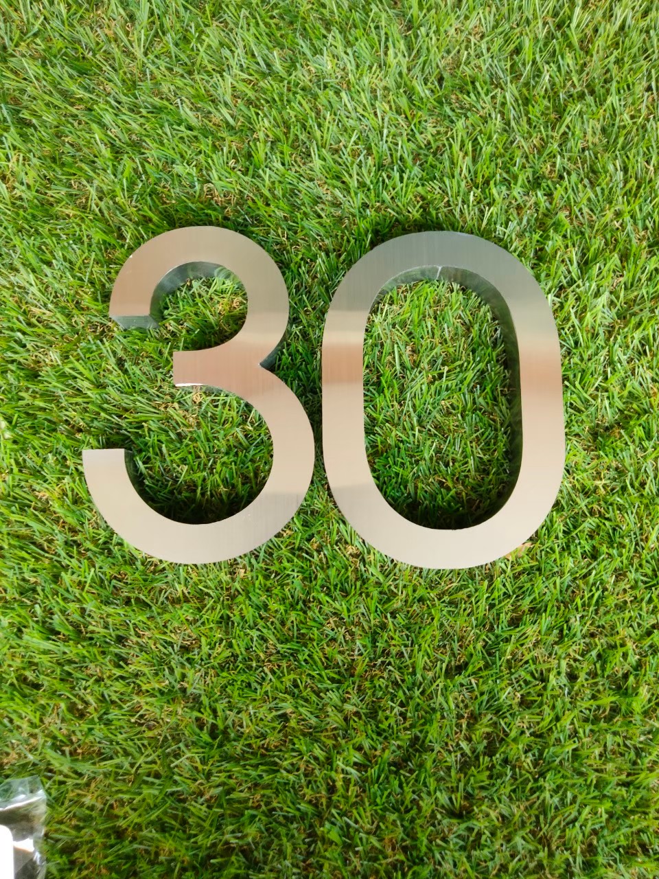 งานป้ายบ้านเลขที่ 30