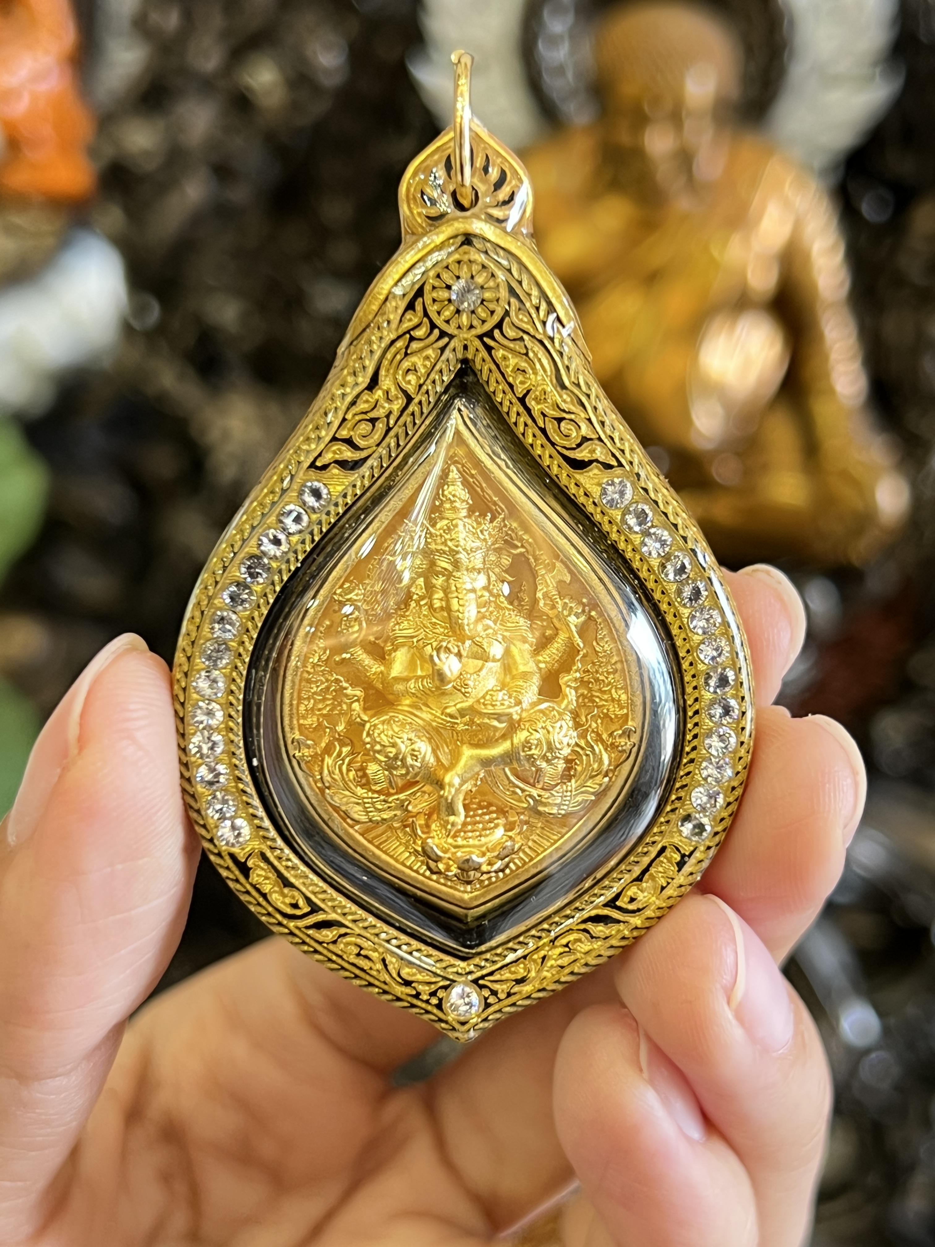 เหรียญพระพิฆเนศ รุ่น ปิติ สุขสำเร็จ เนื้อบรอนซ์ชุบทอง เลี่ยมอคริลิคลายขอบข้าง