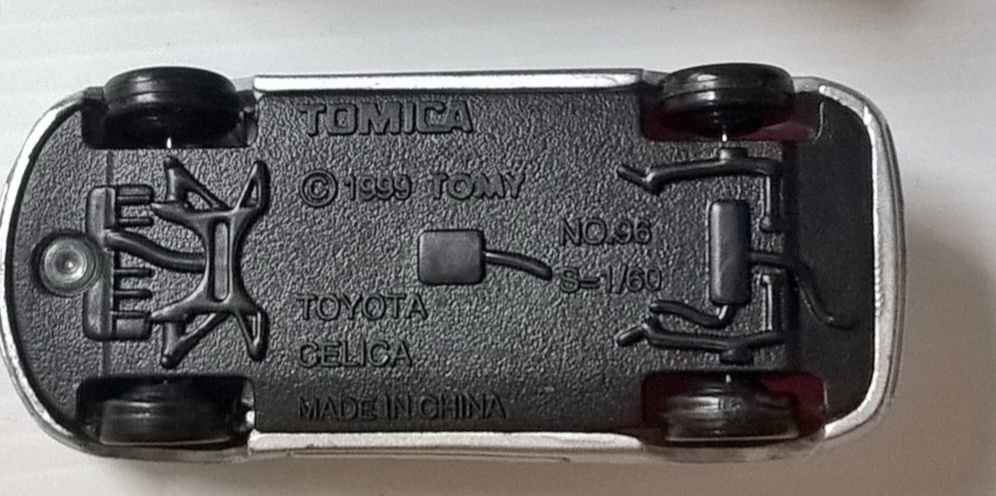 ของเล่น ของสะสม**มีตำหนิ กระจกร้าว ,รถเหล็ก Diecast car รถสปอร์ตสีเงิน เปิดประตูได้ Toyota Celica จาก Tomica