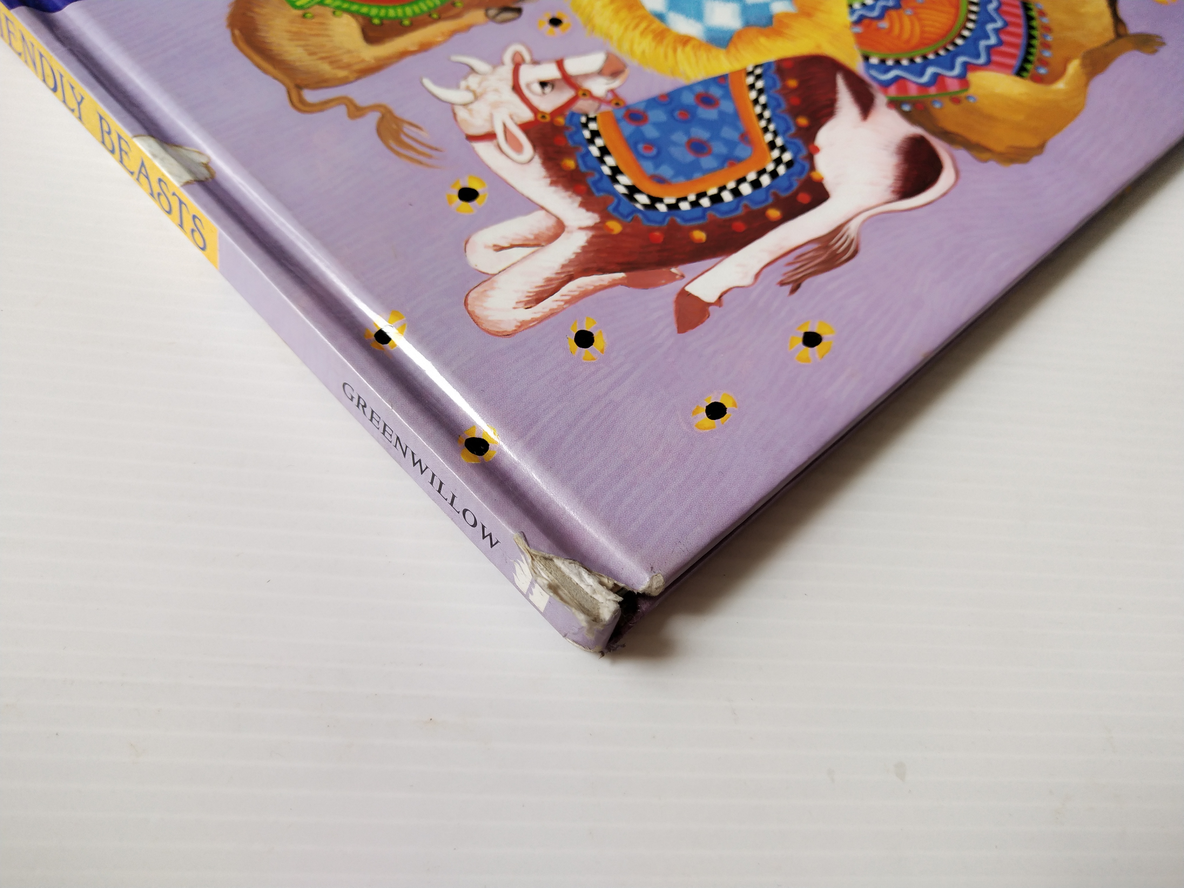 หนังสือนิทาน**มีตำหนิ โปรดดูทุกภาพ ฉบับภาษาอังกฤษ The Friendly Beasts ,a Christmas Carol. ภาพโดย Sharon MacGinley