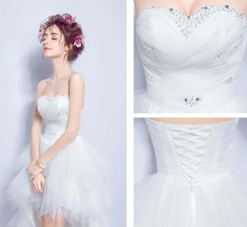 Pre-order ชุดแฟนซี ชุดราตรีสั้น หน้าสั้นหลังยาว สีขาว เกาะอก จับจีบ ปักเลื่อมช่วงอก กระโปรงเป็นชั้น เชือกผูกหลัง