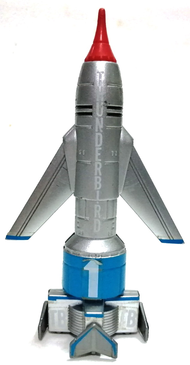 จรวดธันเดอร์เบิร์ด1 (วิหคสายฟ้า 1) ยานธันเดอร์เบิร์ด1 Thunderbird1 วัสดุเหล็กผสมพลาสติก ทำสีสำเร็จ ของ Bandai ปี 1997** กลไกขยับปีชำรุดเสื่อมตามเวลา สะสมสภาพดี เก่าเก็บ