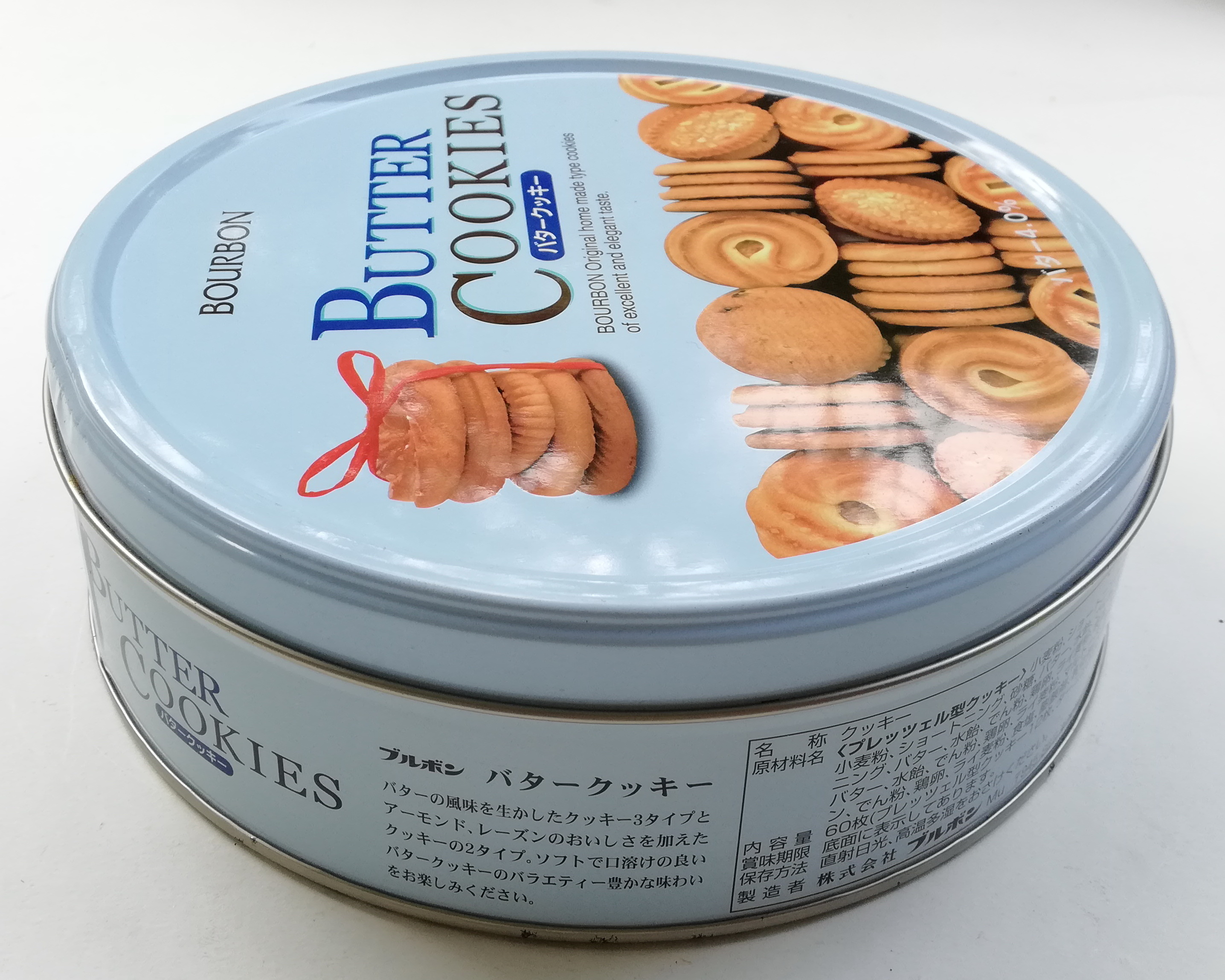 ของสะสม กล่องสังกะสี (กล่องโลหะ) **ฝาปิดไม่สนิท กล่องคุ้กกี้จากญี่ปุ่น กล่องสีฟ้า ยี่ห้อ BOURBON BUTTER COOKIES , ORIGINAL HOMEMADE TYPE COOKIES OF EXCELLENT AND ELEGANT TASTE