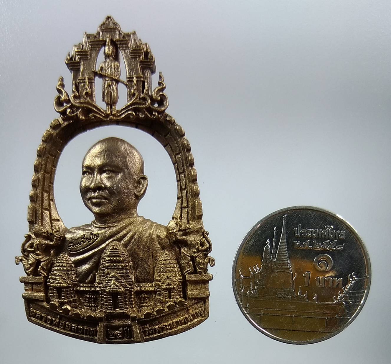 A1247 หลวงพ่ออลงกต วัดพระบาทน้ำพุ จ.ลพบุรี ด้านหลังบรรจุเกศา จีวร