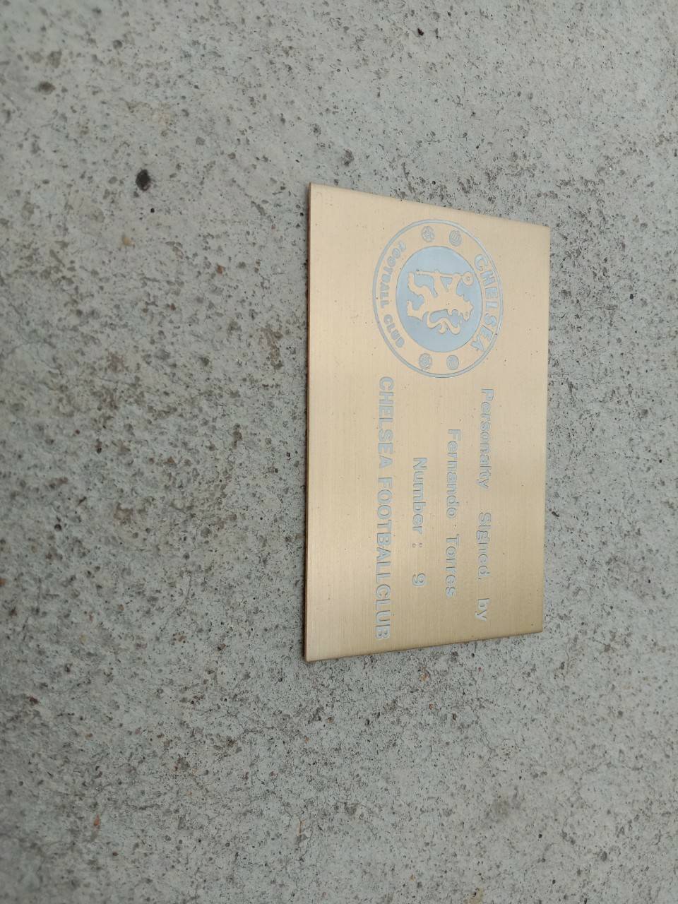 งานป้ายสแตนเลสกัดกรดหน้าทองลงสีขาว