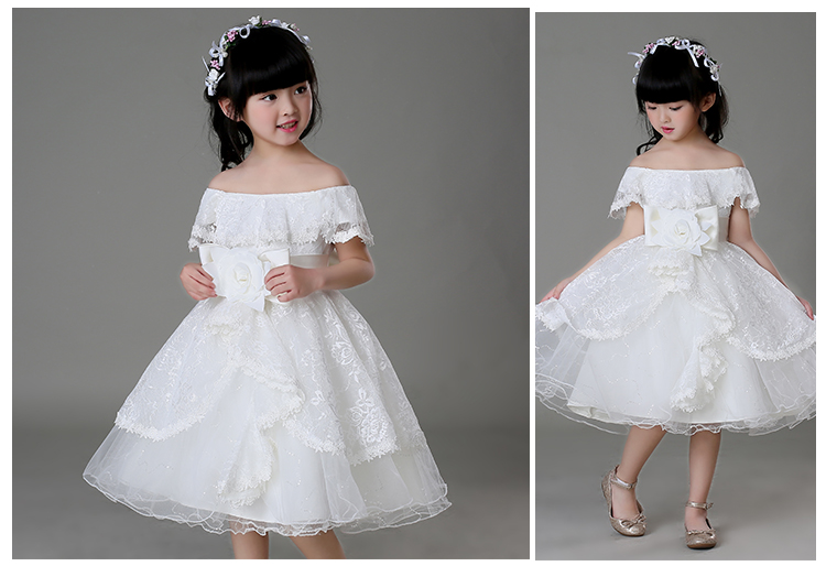 Pre-order ชุดราตรีเด็ก ชุดออกงาน ชุดกระโปรงสไตล์เจ้าหญิง แบบไหล่ปาด มีระบายช่วงอก แต่งดอกแต่งโบว์คาดเอว กระโปรงตาข่ายเป็นชั้น ๆ ซิปหลัง