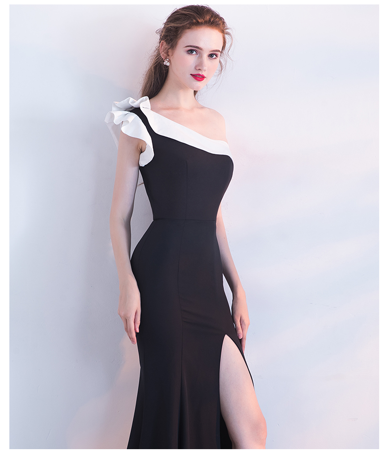 ชุดราตรียาวไหล่เดียว แต่งระบาย สีดำ ทรงเข้ารูป แบบเก๋ (ซิปหลัง)