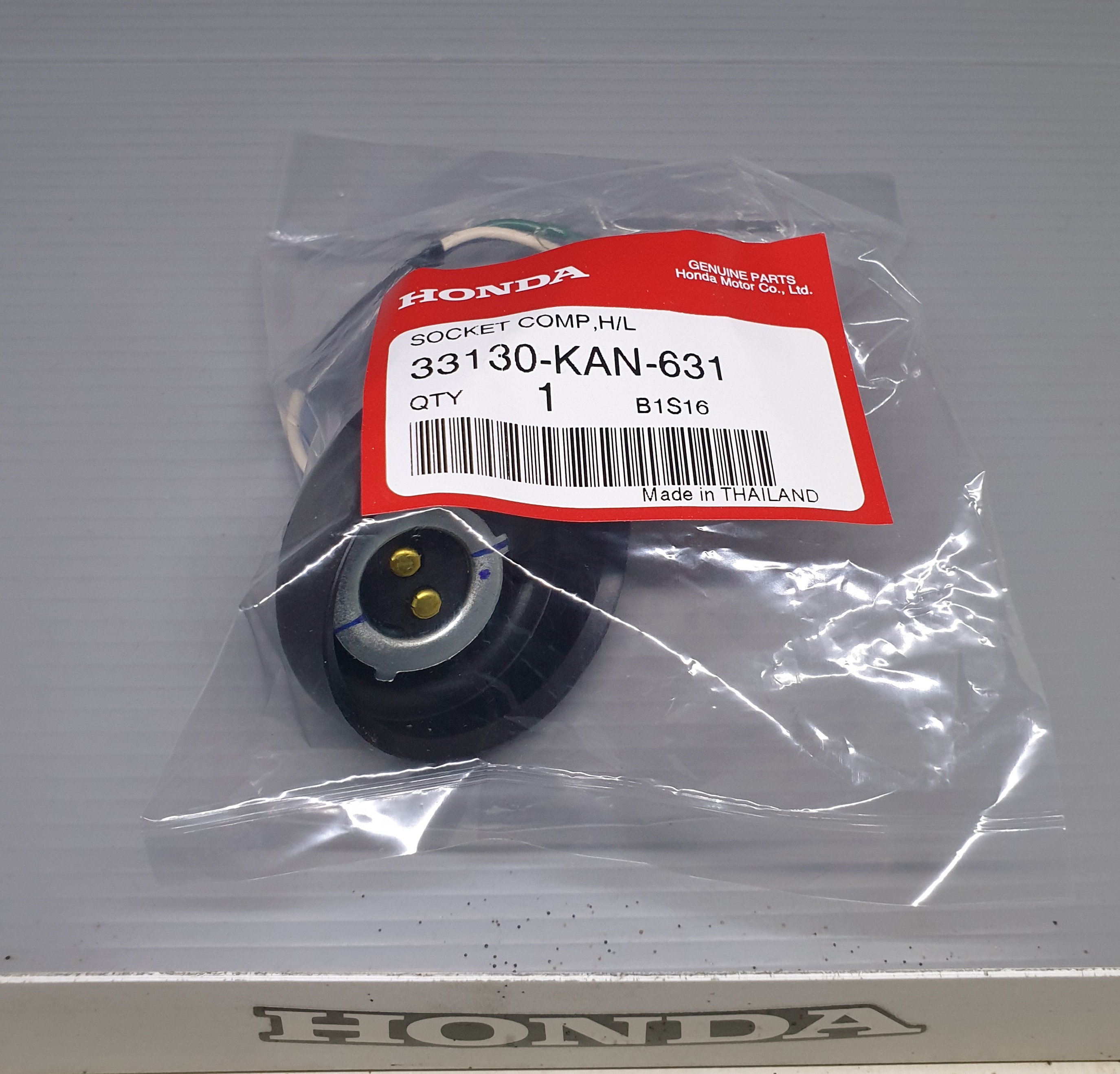 ชุดขั้วหลอดไฟหน้า โซนิค125(ปี2001-3)