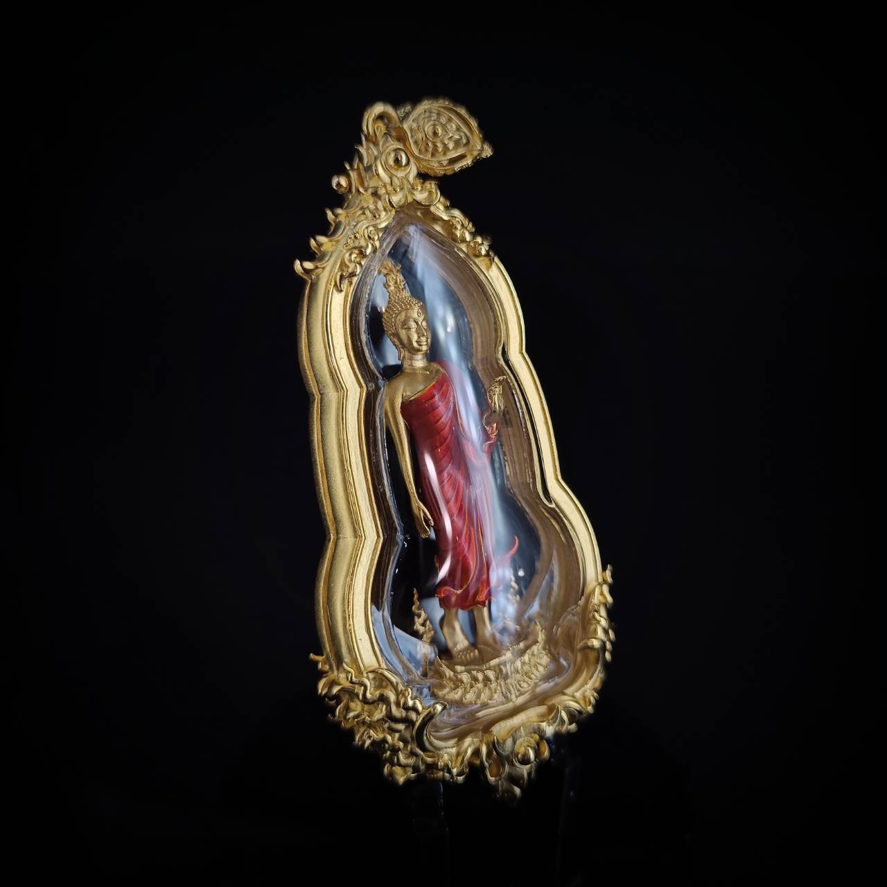 พระพุทธศิริสุขมั่นคงทรัพย์พร้อมเลี่ยมกรอบ รหัส 2 เนื้อบรอนซ์นอกชุบทองลงยาจีวร