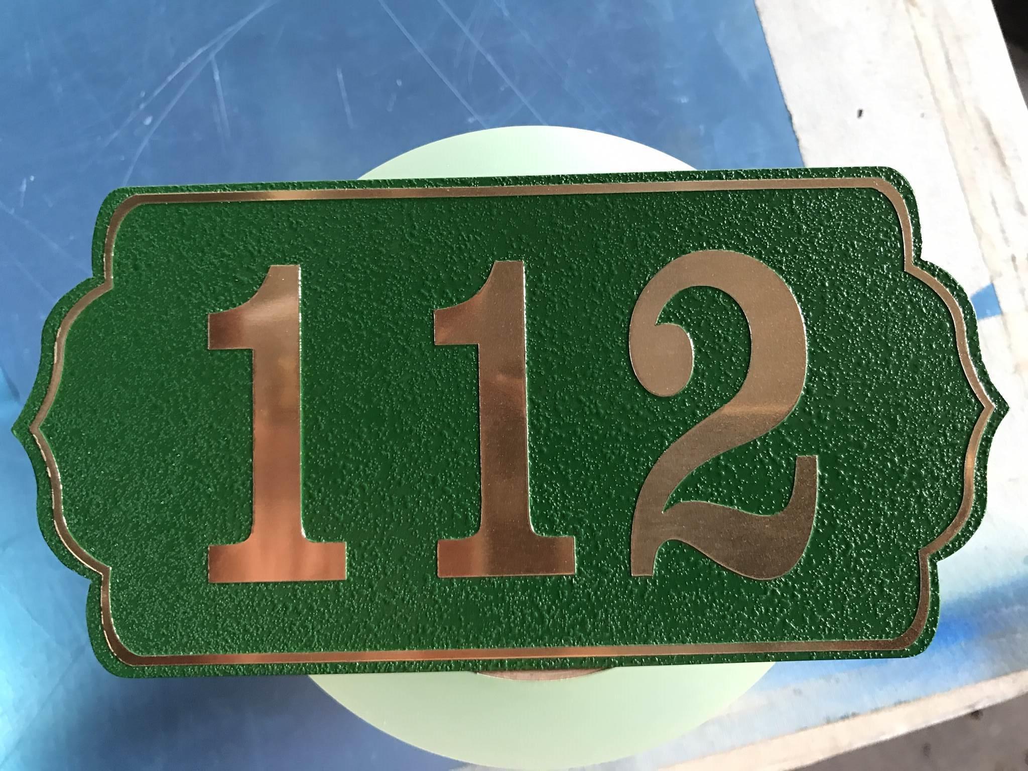 ป้ายสแตนเลสกัดกรด