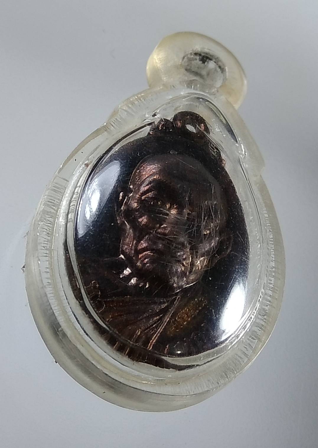 A1764 เหรียญเม็ดแตงหลังพระพิฆเนศร์ หลวงปู่กาหลง เขี้ยวแก้ว วัดเขาแหลม จ.สระแก้ว