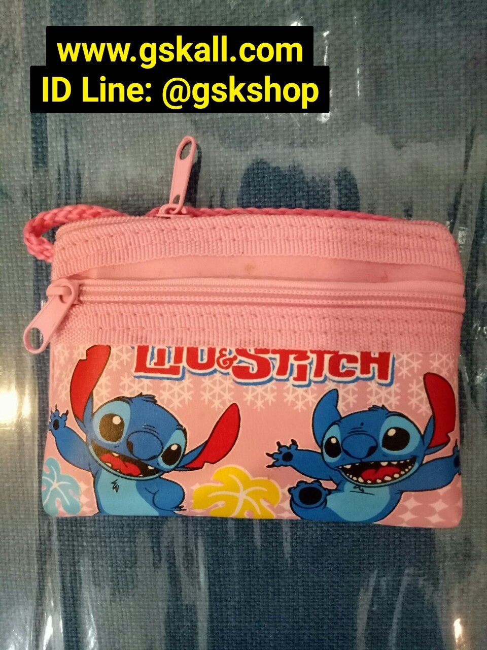 กระเป๋าเด็กมีสองซิปลายสติช