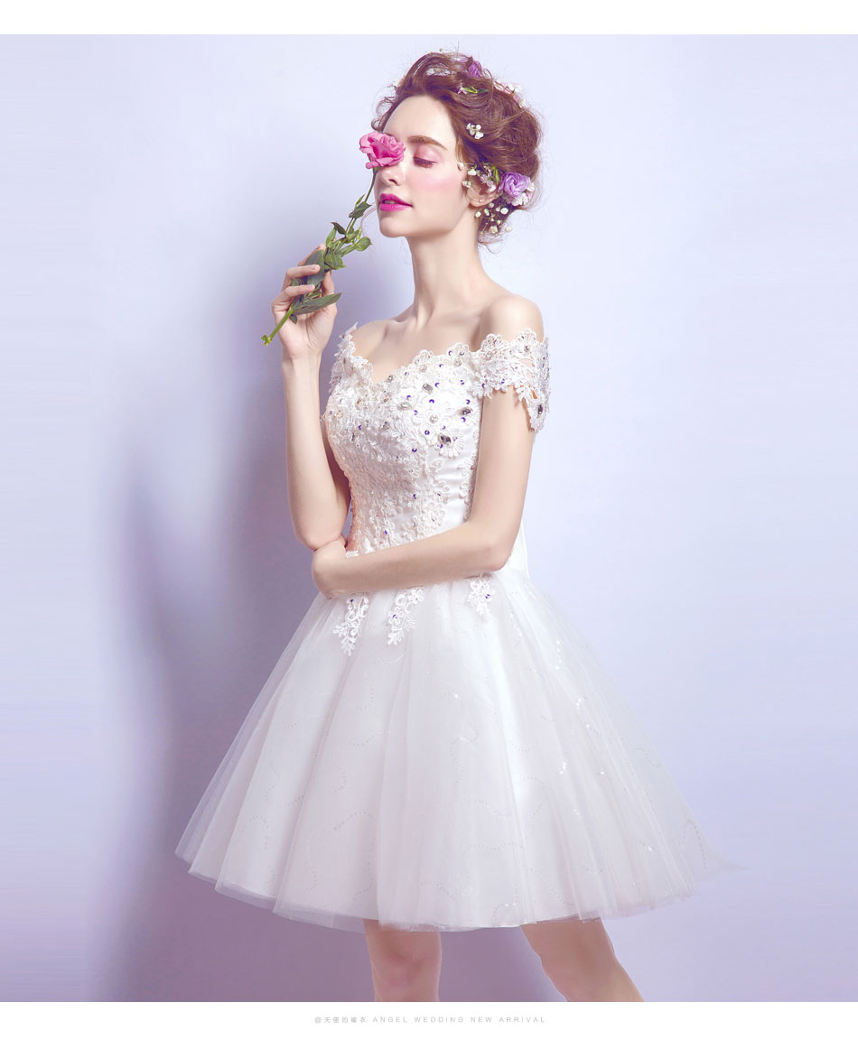 Pre-order ชุดแฟนซี ชุดเจ้าสาว ชุดราตรีสั้น สีขาว ไหล่ปาด ผ้าลูกไม้ แต่งคริสตัล ปักเลื่อมช่วงอก เชือกผูกหลัง