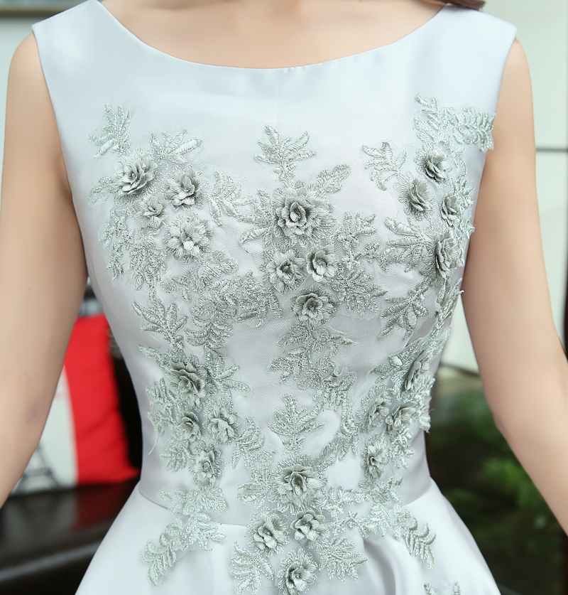 Pre-order ชุดราตรียาว แขนกุด ผ้าซาติน ปักดิ้นลายดอกไม้ช่วงอก เชือกผูกหลัง