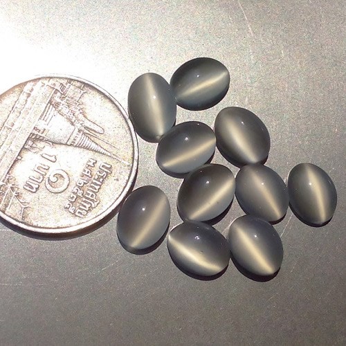 พลอย ตาแมว มูนสโตน Cat eye Moonstone 13.90 กะรัต (Cts.)พลอยแท้ อัญมณีมงคลประจําวันเกิด เครื่องประดับพลอย