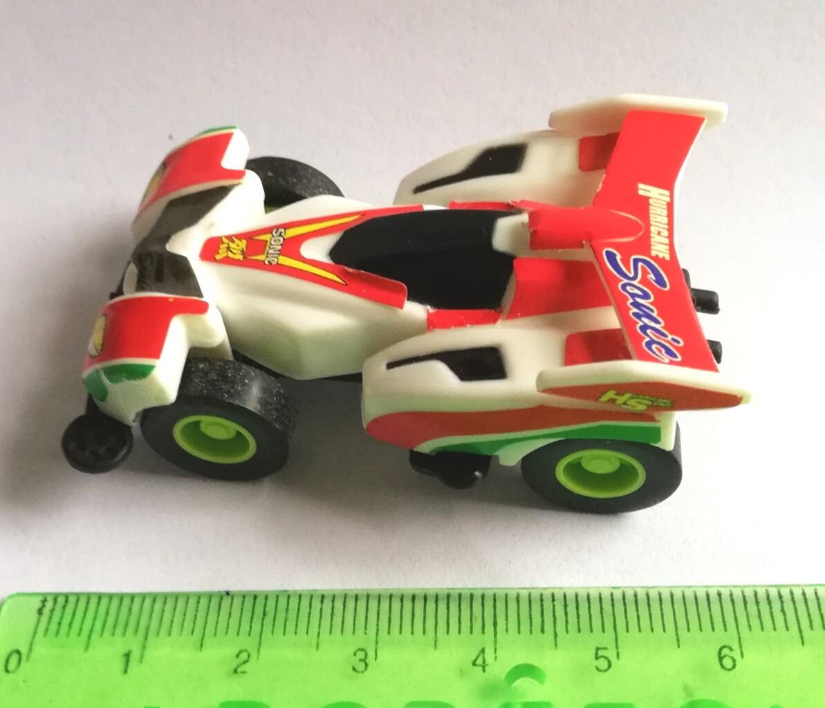 โมเดลรถแข่งในแคปซูล สีแดง ขนาดประมาณ 6 cm. pull back ของสะสมเก่า จาก 7-11