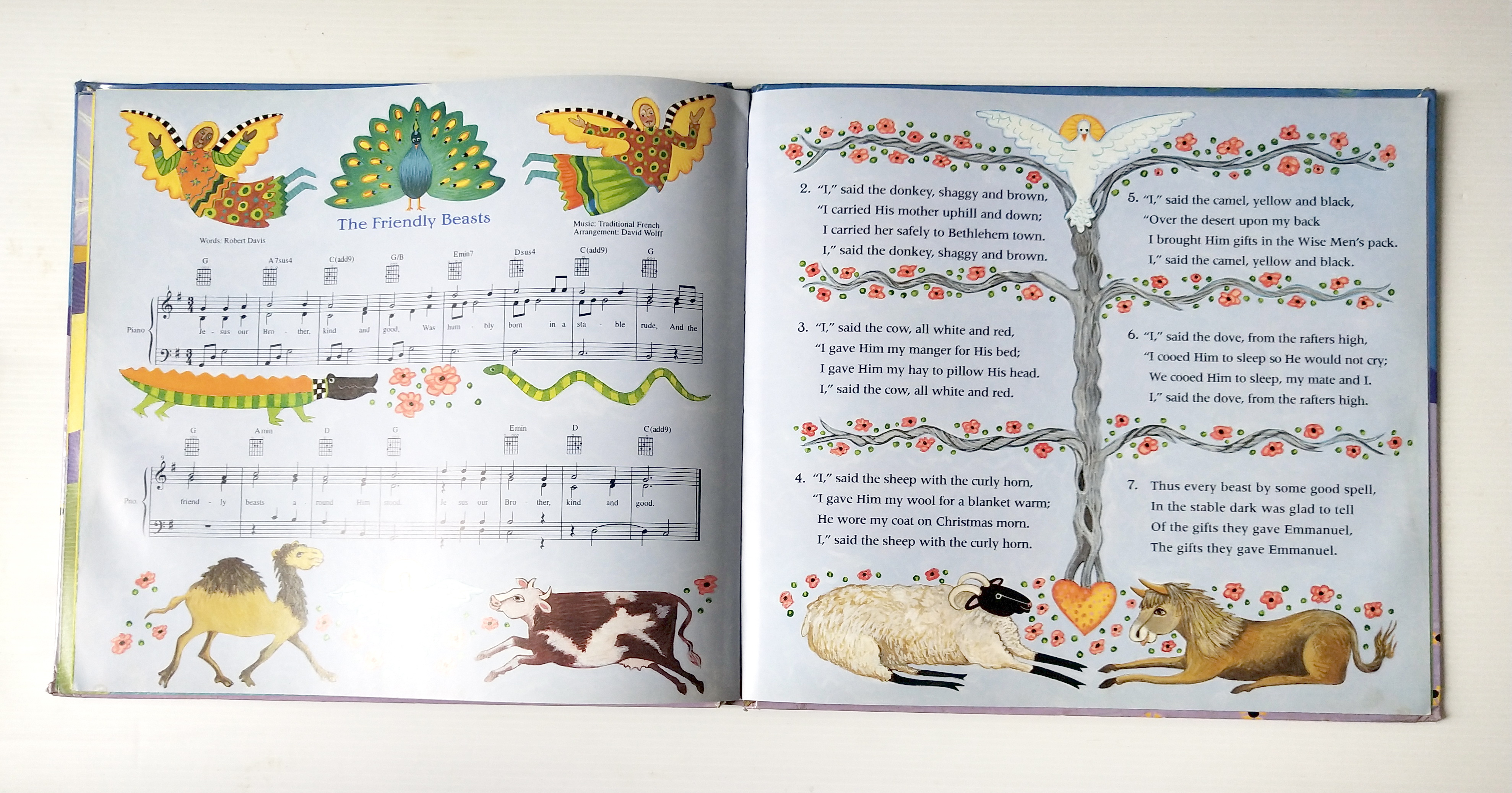 หนังสือนิทาน**มีตำหนิ โปรดดูทุกภาพ ฉบับภาษาอังกฤษ The Friendly Beasts ,a Christmas Carol. ภาพโดย Sharon MacGinley