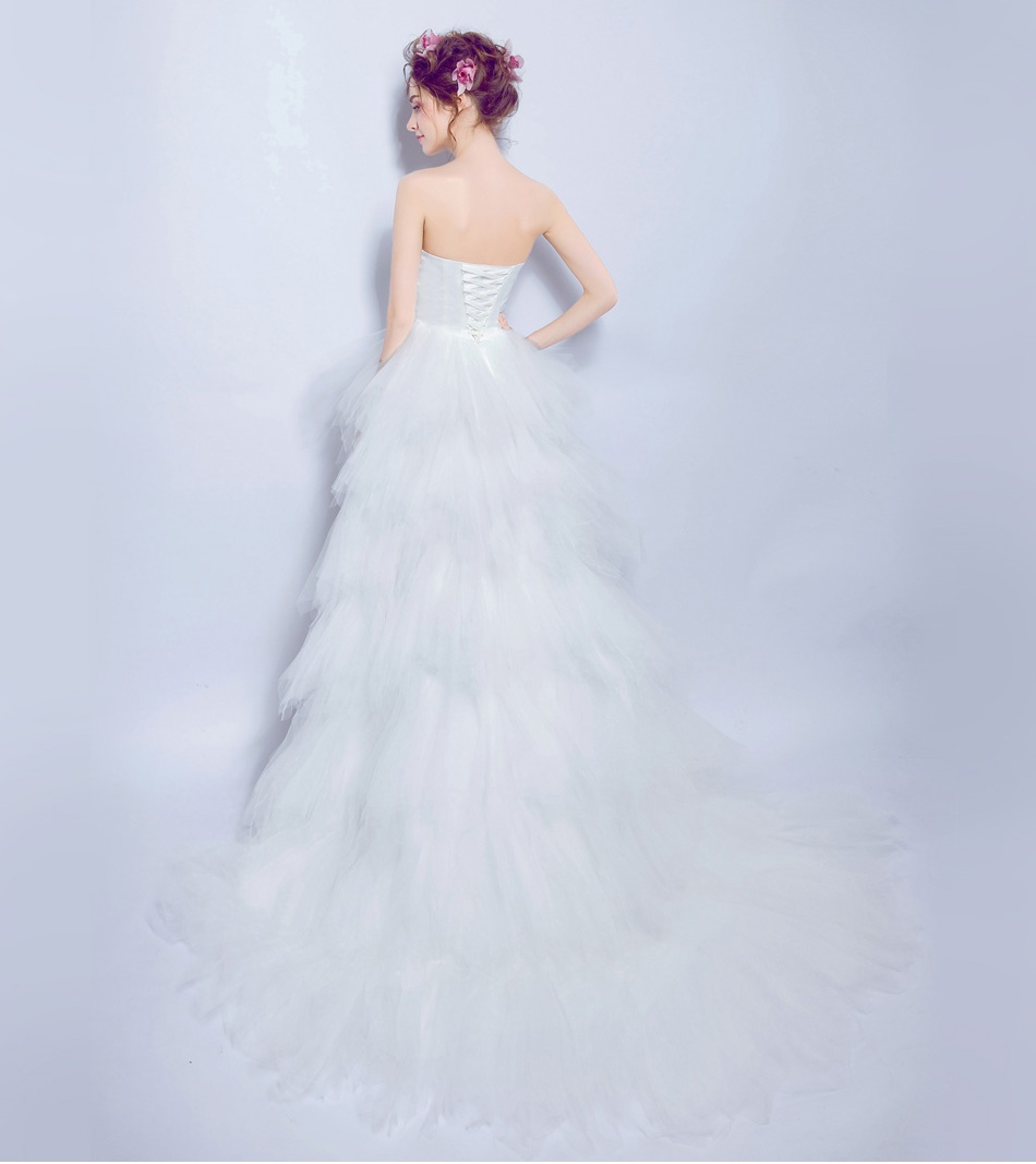 Pre-order ชุดแฟนซี ชุดราตรีสั้น หน้าสั้นหลังยาว สีขาว เกาะอก จับจีบ ปักเลื่อมช่วงอก กระโปรงเป็นชั้น เชือกผูกหลัง