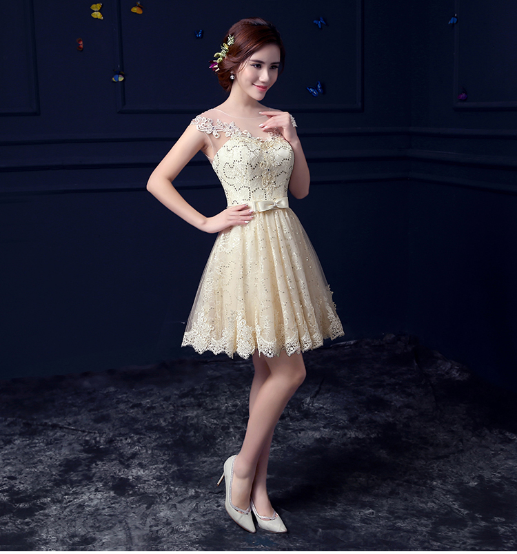 Pre-order ชุดราตรีสั้น แขนกุด คอกลม สีแชมเปญ แต่งเลื่อม ลูกไม้ คาดโบว์ที่เอว เชือกผูกหลัง