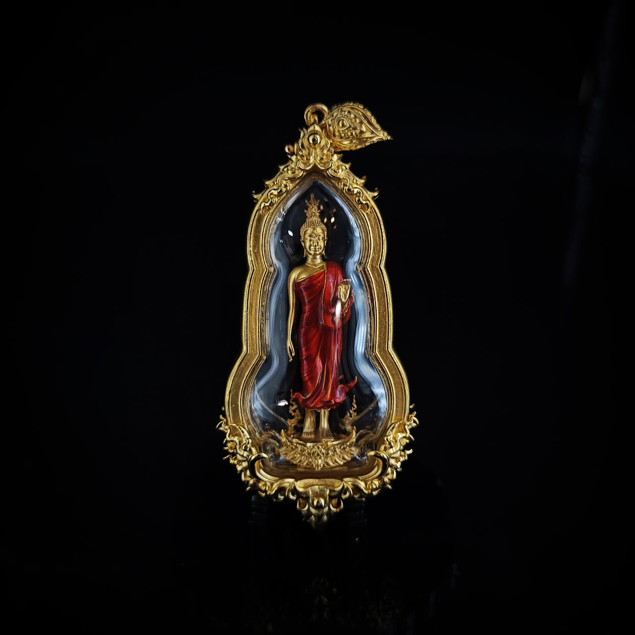 พระพุทธศิริสุขมั่นคงทรัพย์พร้อมเลี่ยมกรอบ รหัส 2 เนื้อบรอนซ์นอกชุบทองลงยาจีวร