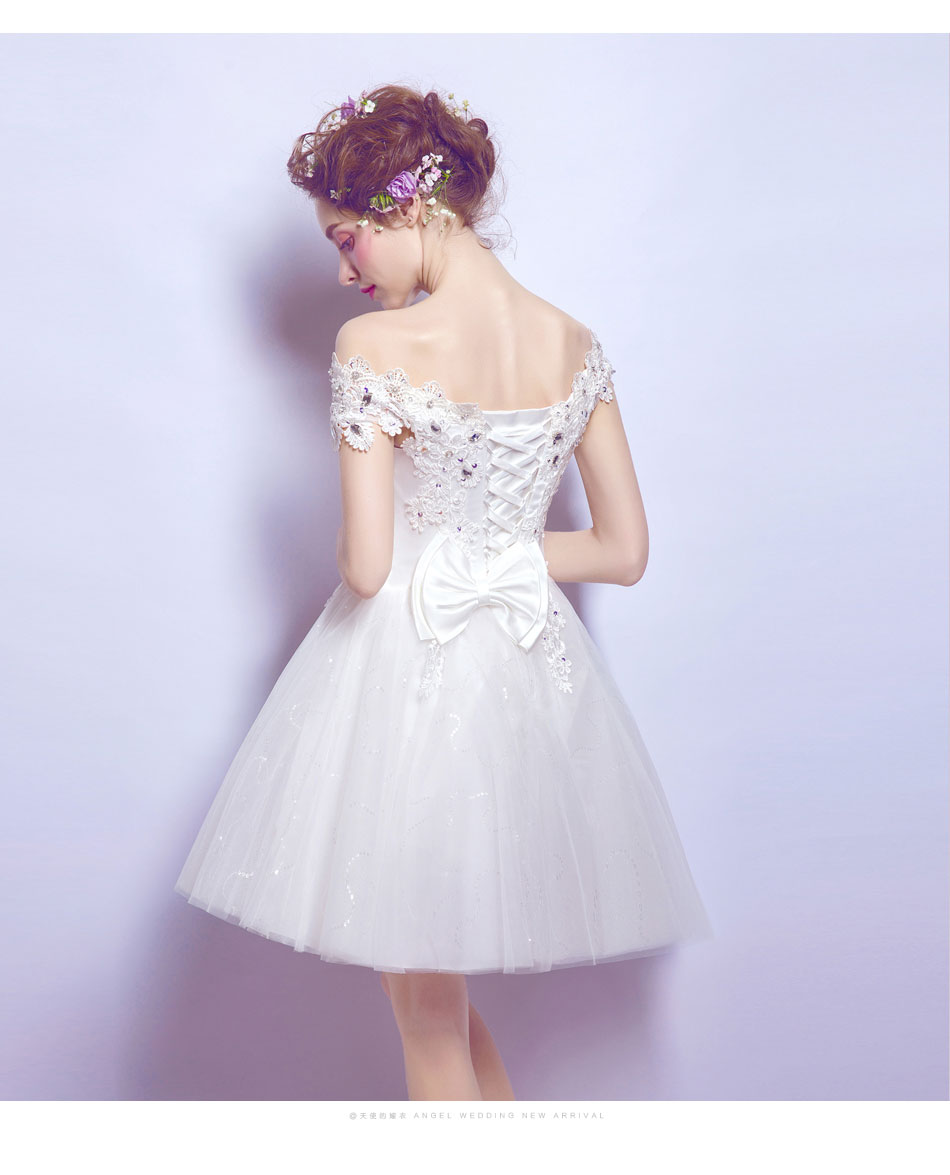 Pre-order ชุดแฟนซี ชุดเจ้าสาว ชุดราตรีสั้น สีขาว ไหล่ปาด ผ้าลูกไม้ แต่งคริสตัล ปักเลื่อมช่วงอก เชือกผูกหลัง