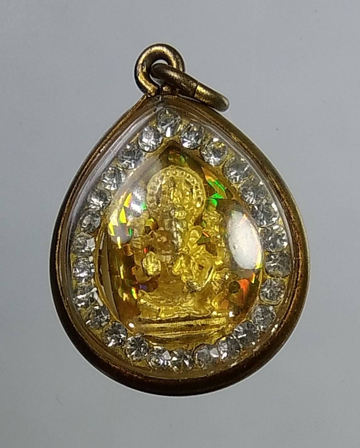 L151 จี้พระพิฆเนศ ล้อมพลอย ทรงหยดน้ำ หลังยันต์ ไม่ทราบที่ครับ