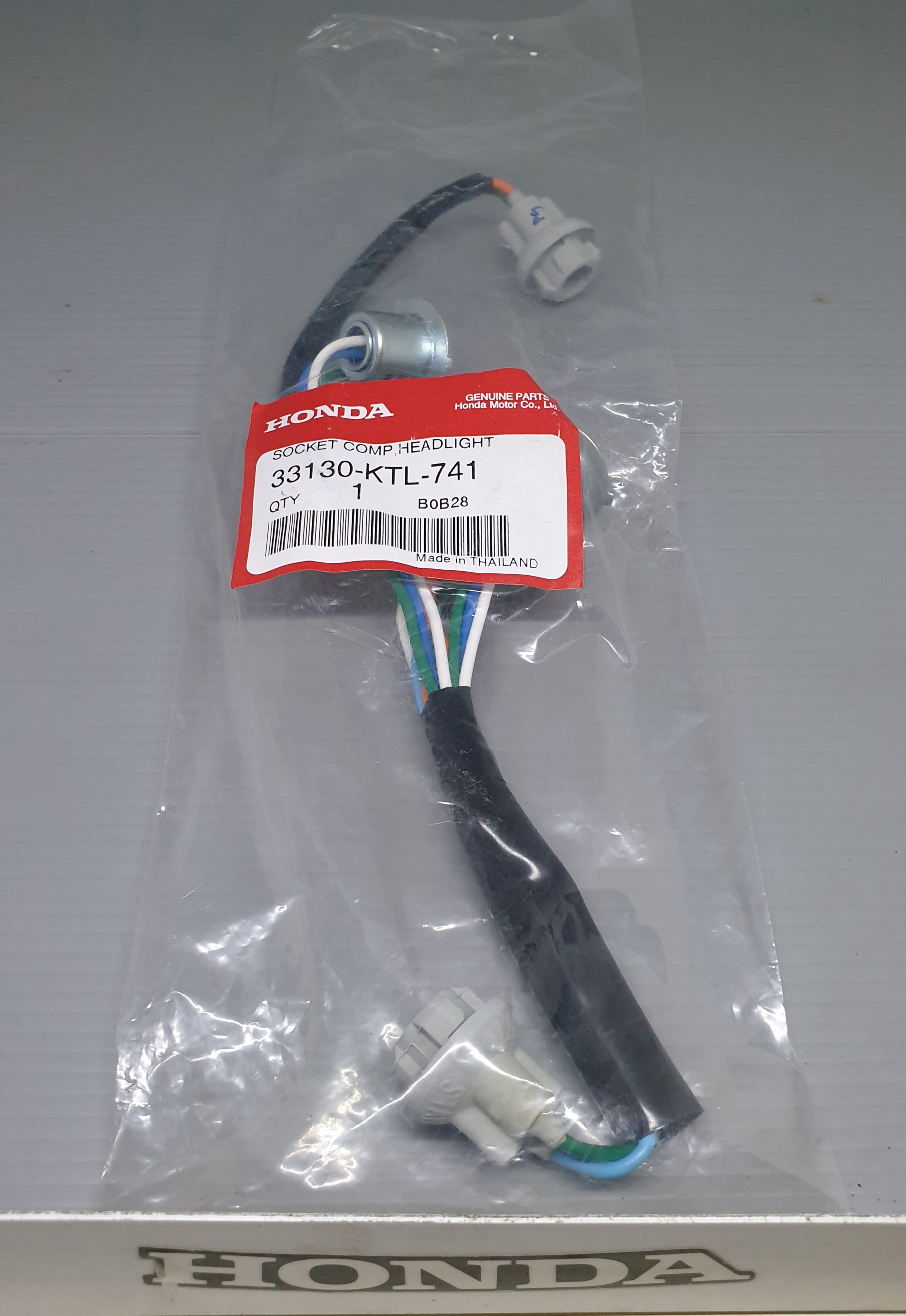 ชุดขั้วหลอดไฟหน้า เวฟ100R,K(ยูบล๊อก)