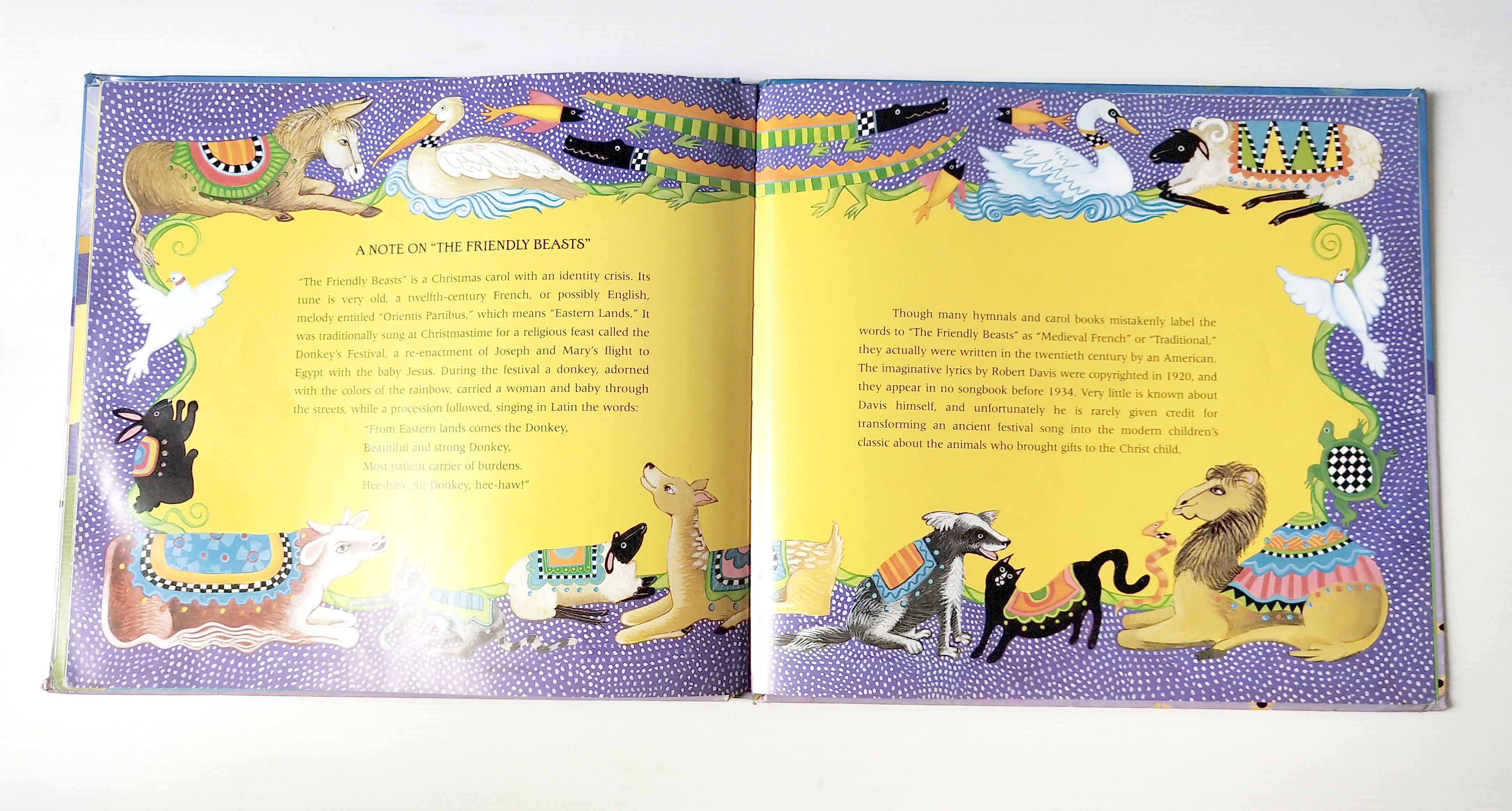 หนังสือนิทาน**มีตำหนิ โปรดดูทุกภาพ ฉบับภาษาอังกฤษ The Friendly Beasts ,a Christmas Carol. ภาพโดย Sharon MacGinley