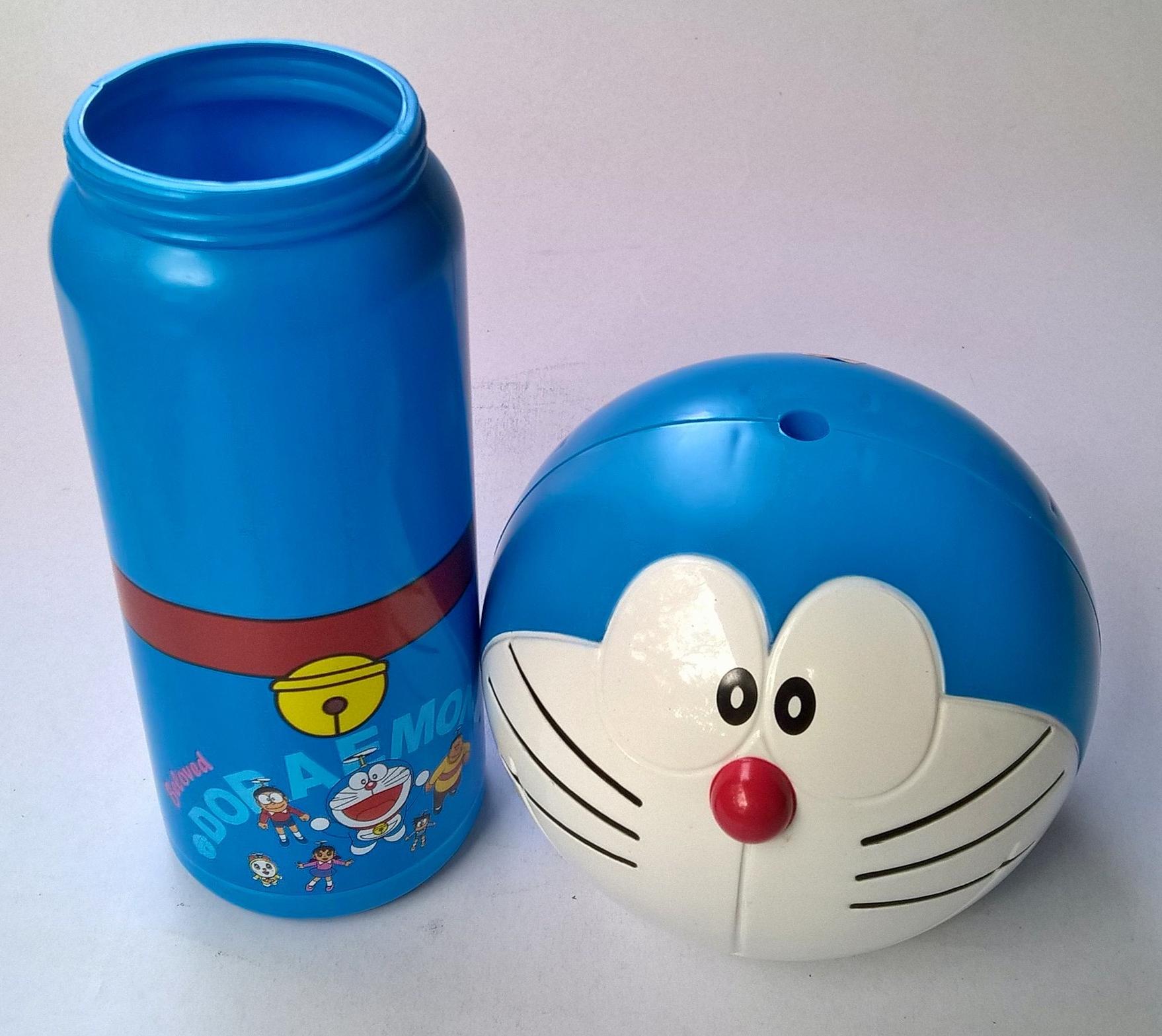 ของสะสม **แก้มมีจุดสีชมพูมาจากโรงงาน ตามภาพ,หัวโดราเอม่อน Doraemon ของสะสมจากJiffy เป็นกระบอกใส่น้ำน่ารักสีฟ้า