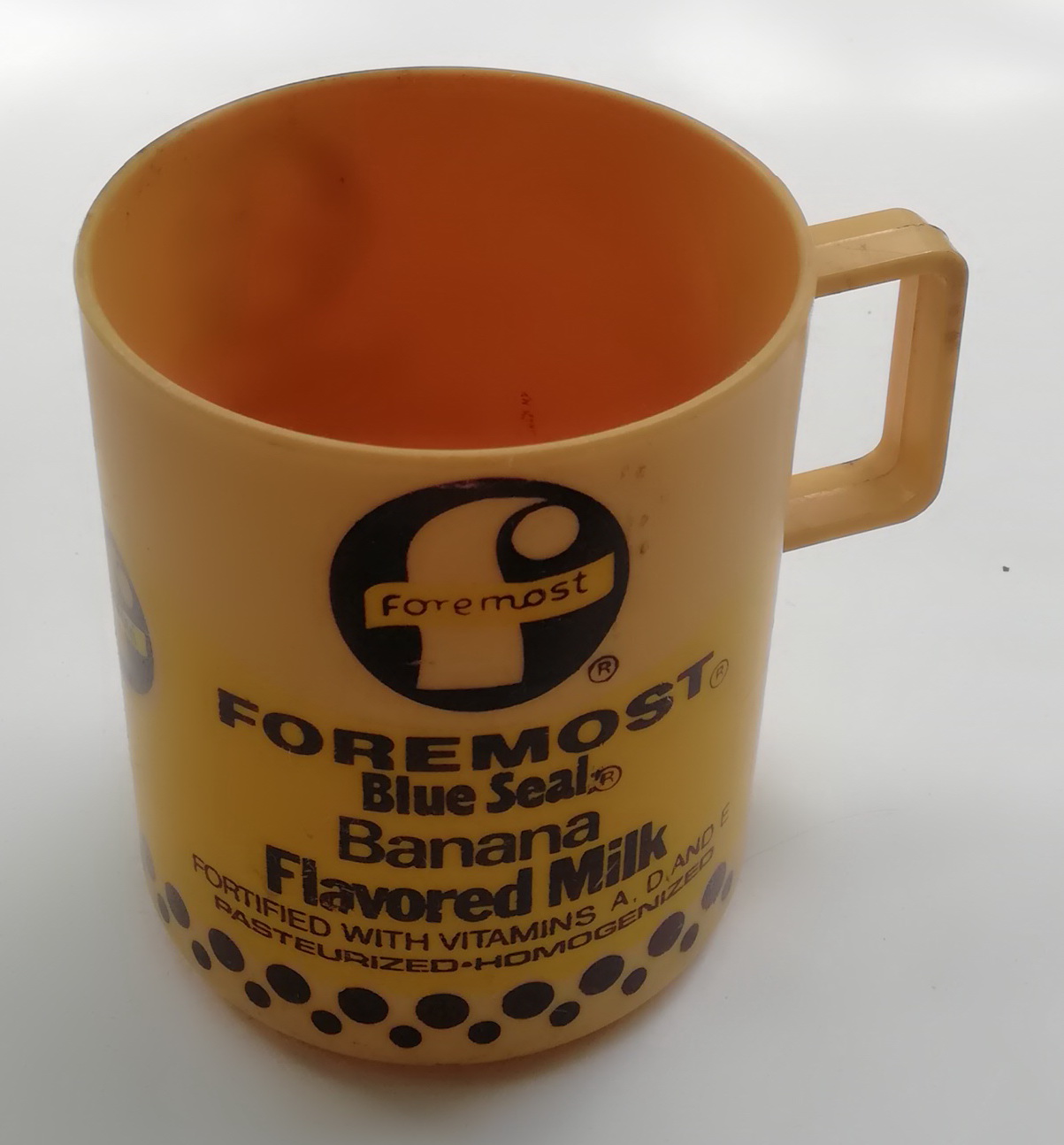 ของเก่าสะสม แก้วน้ำพลาสติกขนาดเล็กมีหู ของสะสมจากForemost,Foremost Blue Seal,Banana Flavoured Milk เส้นผ่าศูนย์กลาง 3",สูง 3.4" **ของเก่ามีตำหนิ โปรดตรวจสอบทุกภาพ
