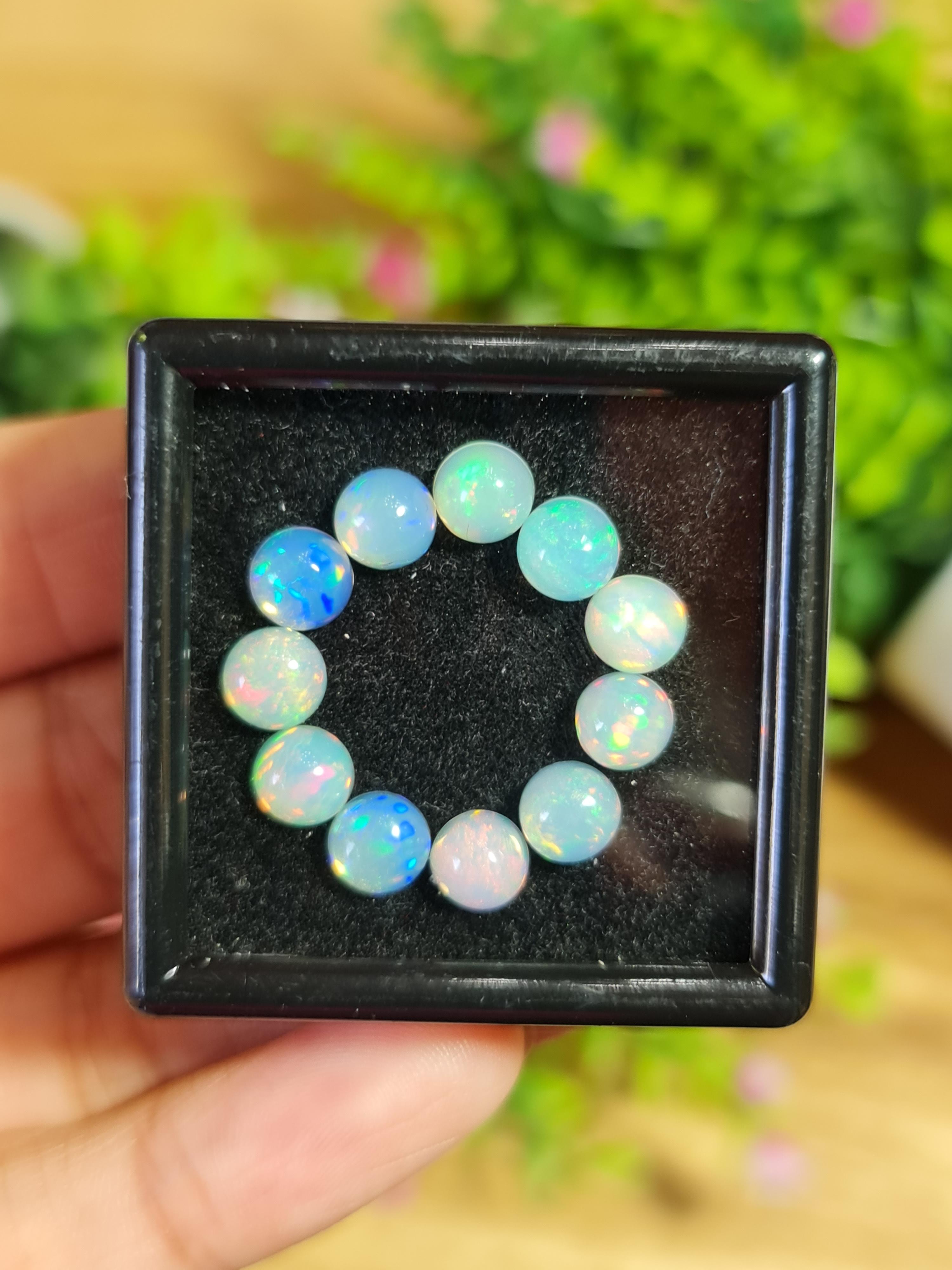 พลอย โอปอล Opal 11 เม็ด (Pcs.) 7.74 กะรัต (Cts.)พลอยแท้ อัญมณีมงคลประจําวันเกิด เครื่องประดับพลอย