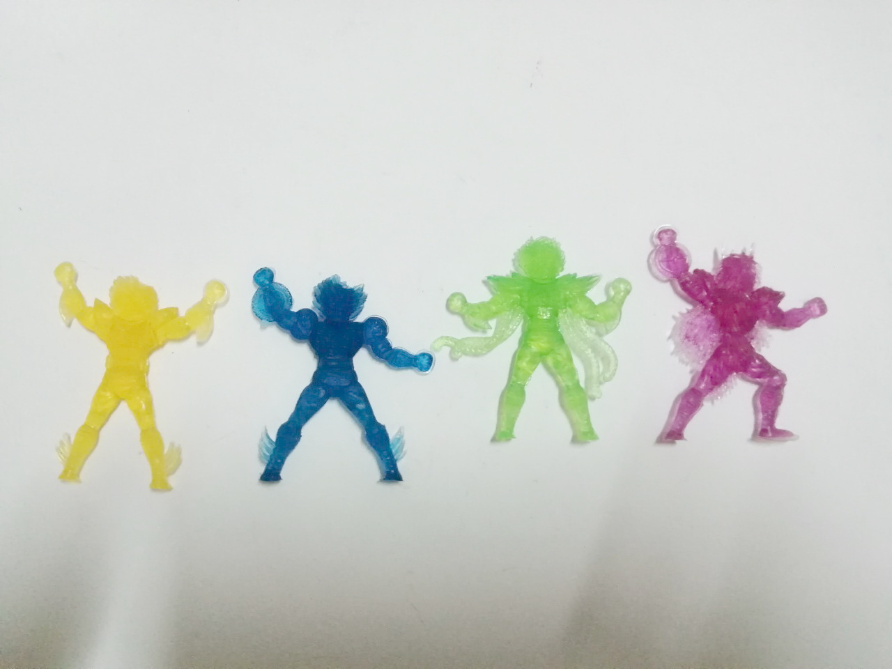 ตุ๊กตุ่นยาง เซนต์เซย่า เปกาซัส เซยย่า(เหลือง) ดราก้อน ชิริว(ม่วง) ฟินิกซ์ อิคคิ(เขียว) ซิกนัส เฮียวกะ(น้ำเงิน)