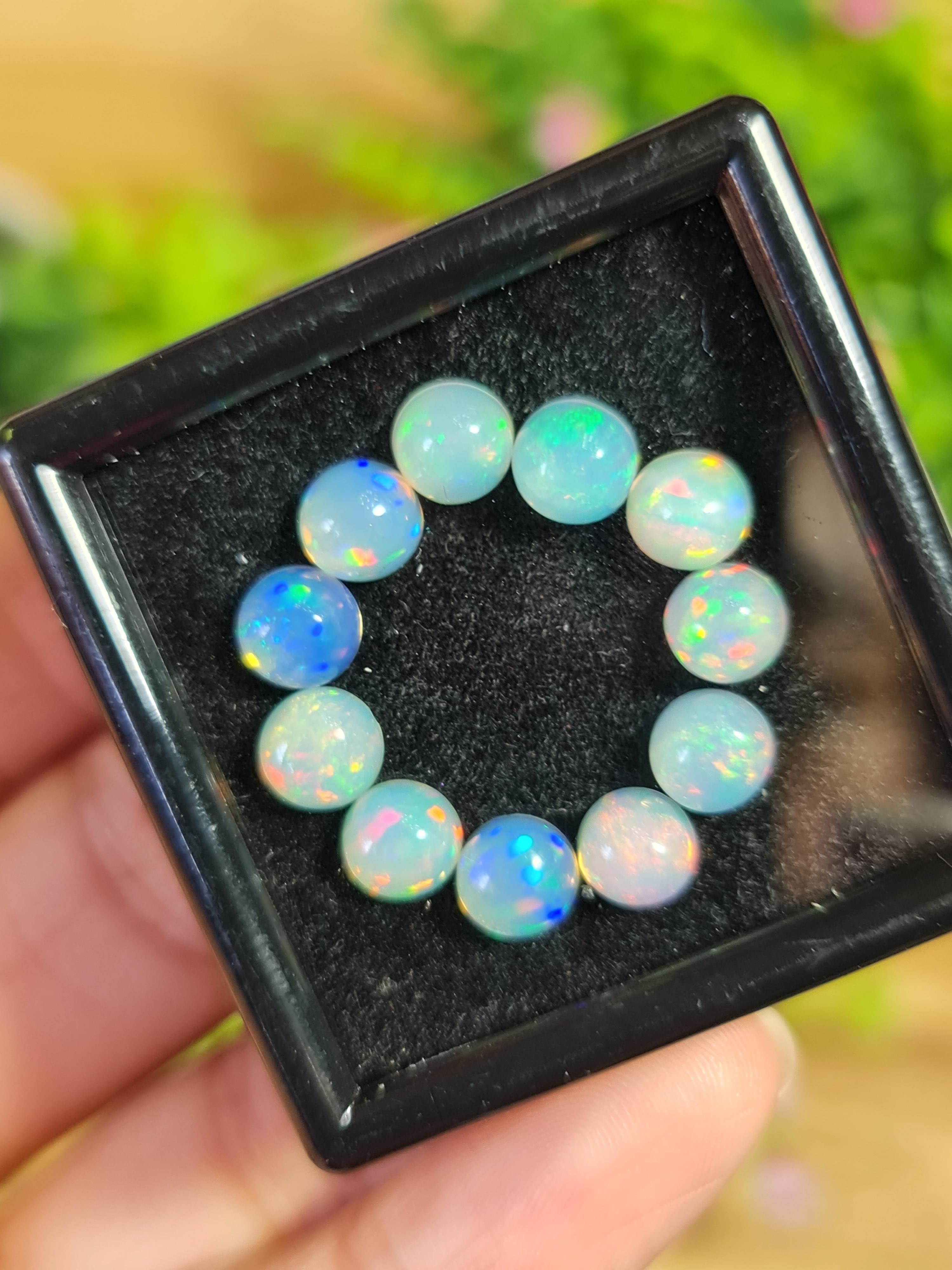 พลอย โอปอล Opal 11 เม็ด (Pcs.) 7.74 กะรัต (Cts.)พลอยแท้ อัญมณีมงคลประจําวันเกิด เครื่องประดับพลอย