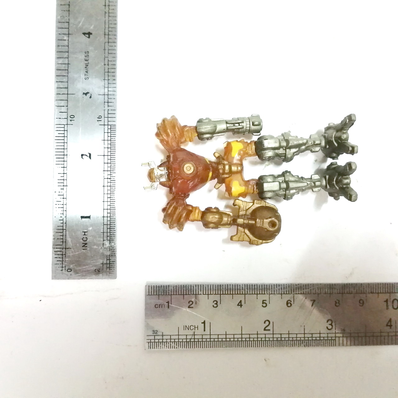 ตุ๊กตุ่นยาง ตัวใส ทำสีบางจุด สีโลหะบางจุด หุ่นยนต์ อะครอยเยอร์ จากไมโครแมน ขนาดตามรูป เก่าเก็บสภาพดี ขนาดใหญ่กว่าปกติ