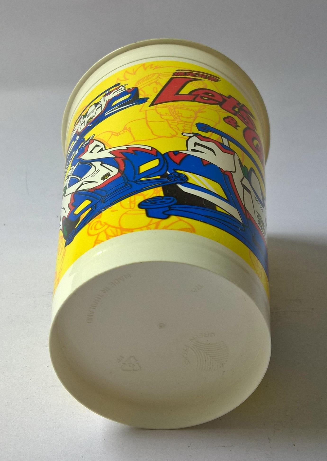 แก้วน้ำพลาสติกสีเหลือง งานเก่า พิมพ์ลายแมกนั่ม เล็ทส แอนด์ โก MAGNUM LET'S and GO นักซิ่งสายฟ้า ของสะสมจาก 7-11 ของเก่า โปรดตรวจสอบทุกภาพ